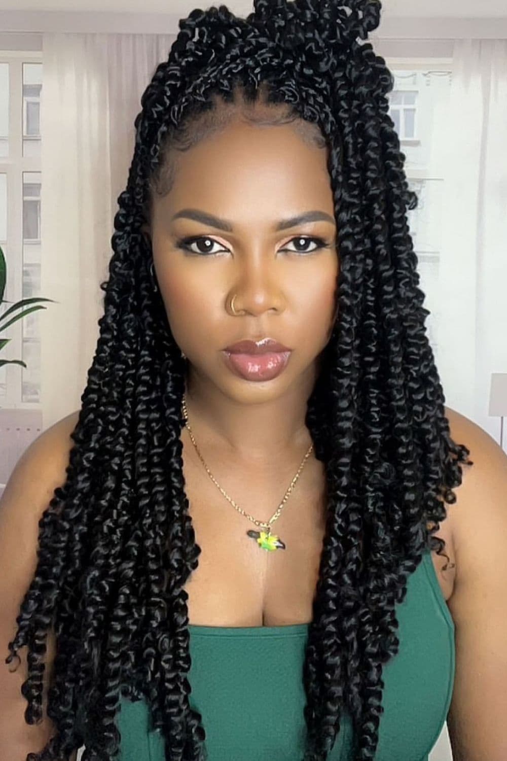 A woman with black crochet passion twists.
