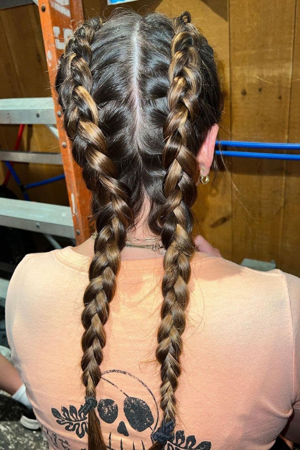 A woman with double Dutch braids.