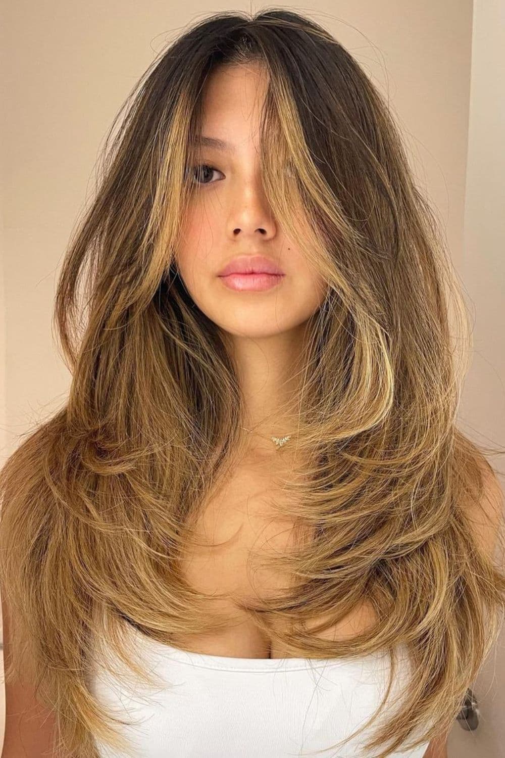 A woman with blonde layered ombre.
