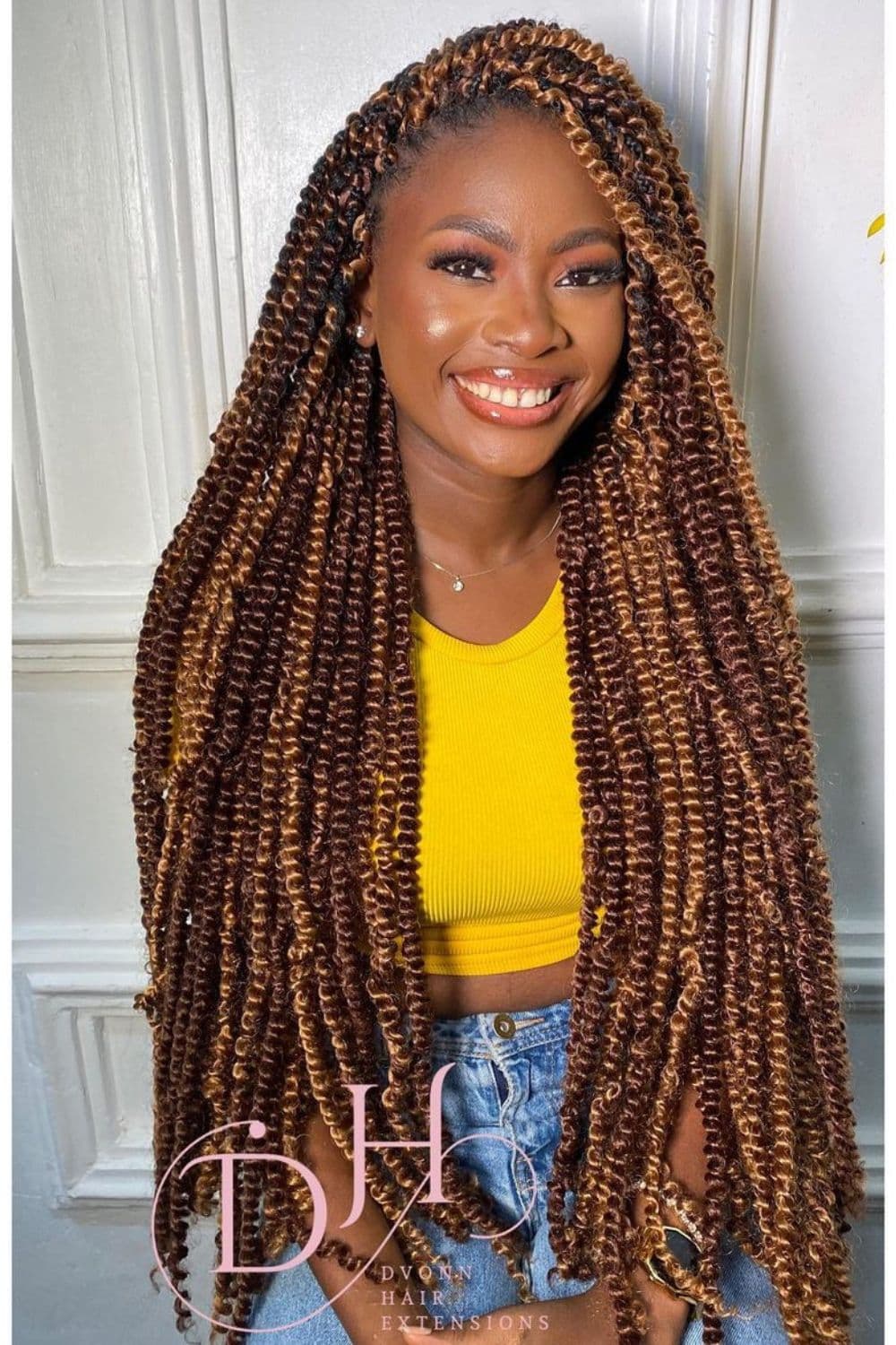 A woman with a brown, long passion twists.