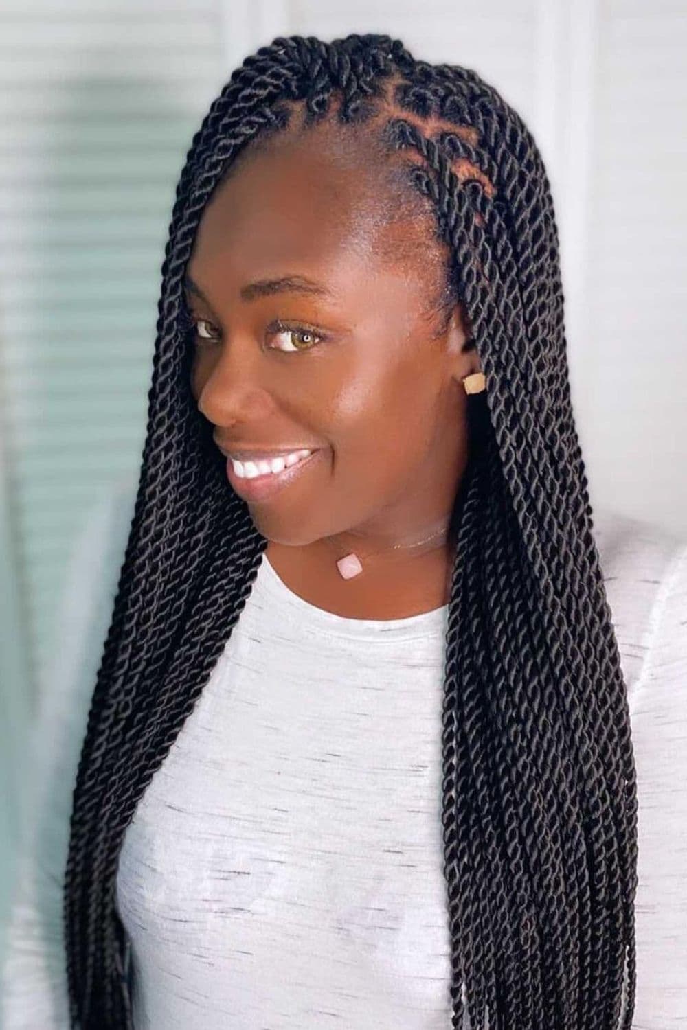 A woman with black Senegalese twists.