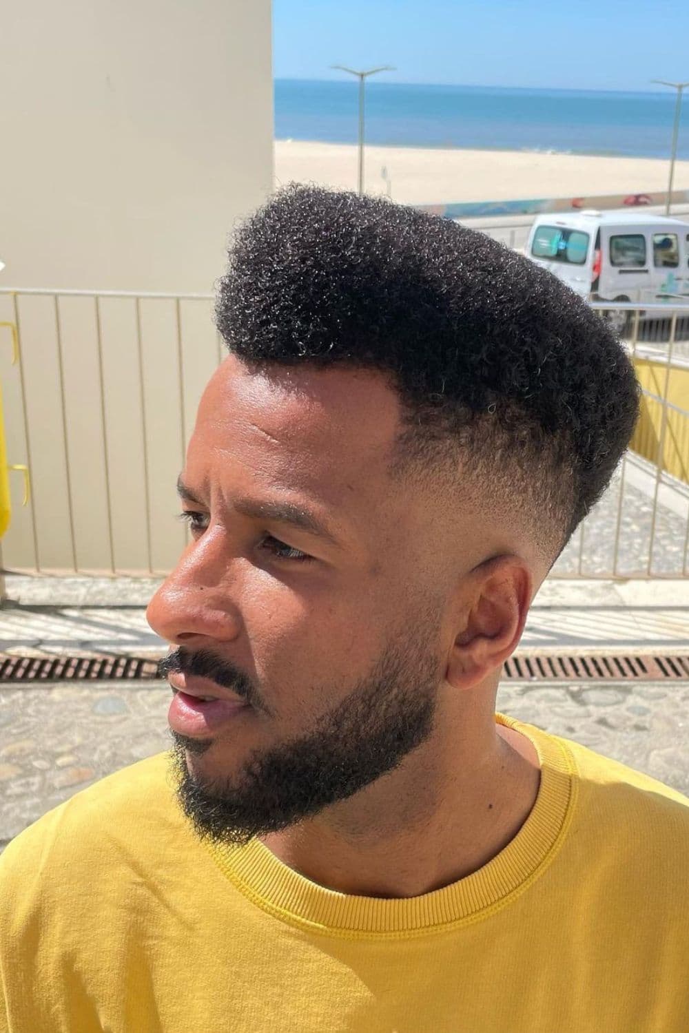 A man with an Afro cut.