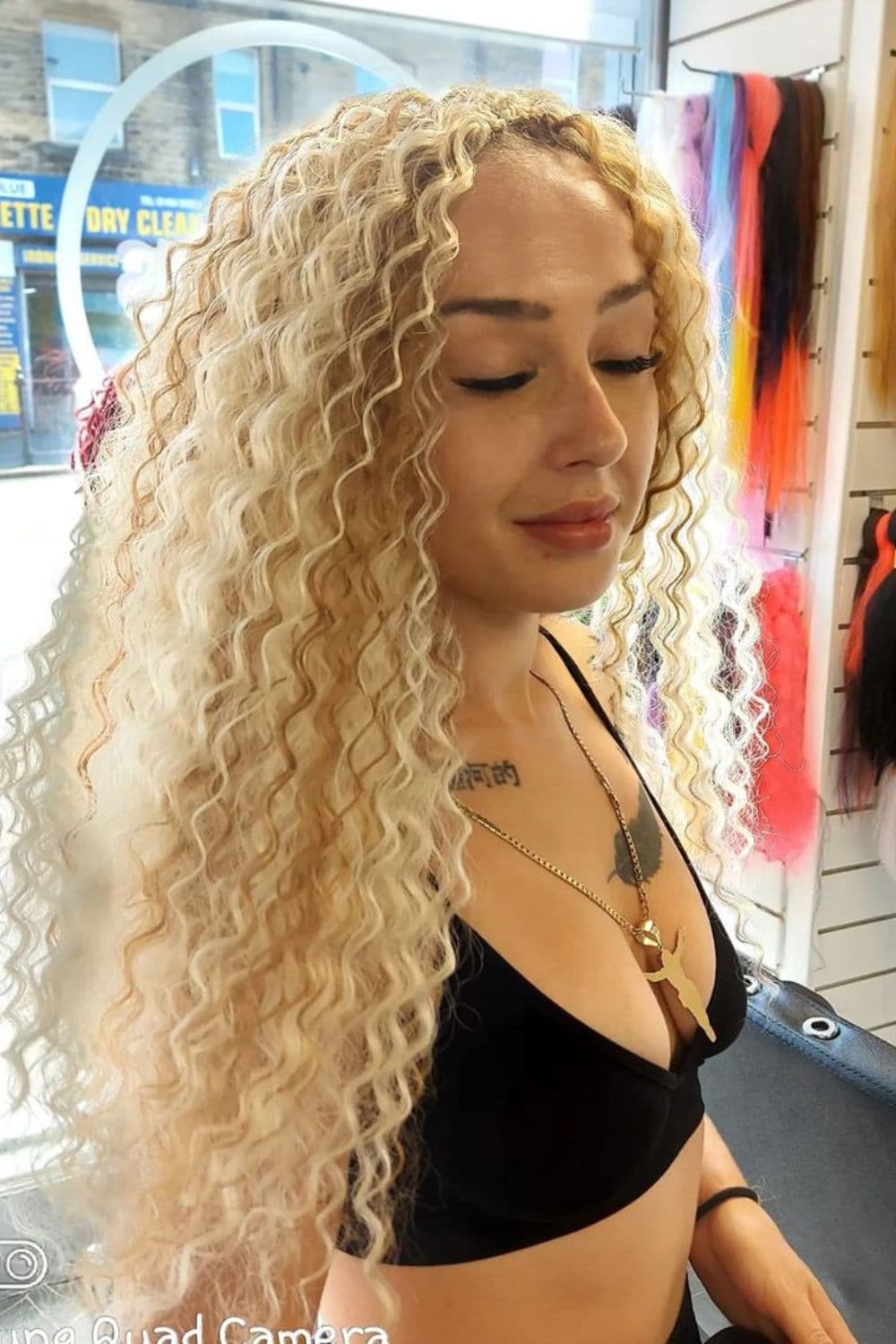 A woman with blonde crochet braids.