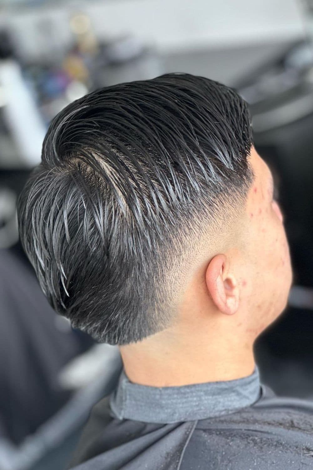 A man with a burst fade cut.