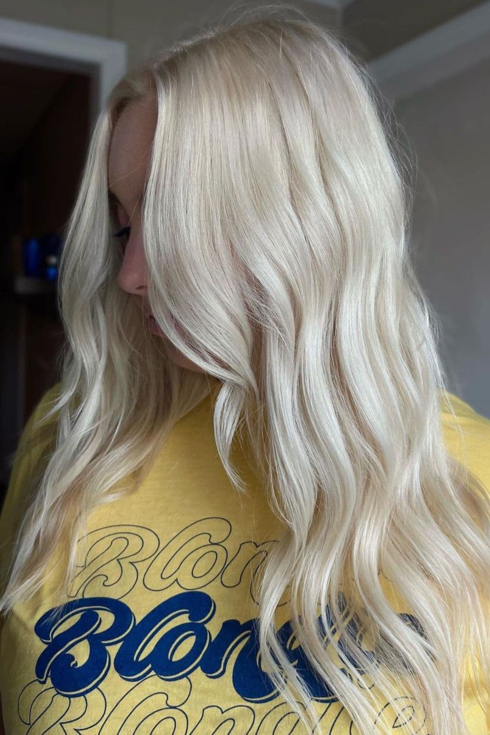 A woman with long classic platinum blonde hair.