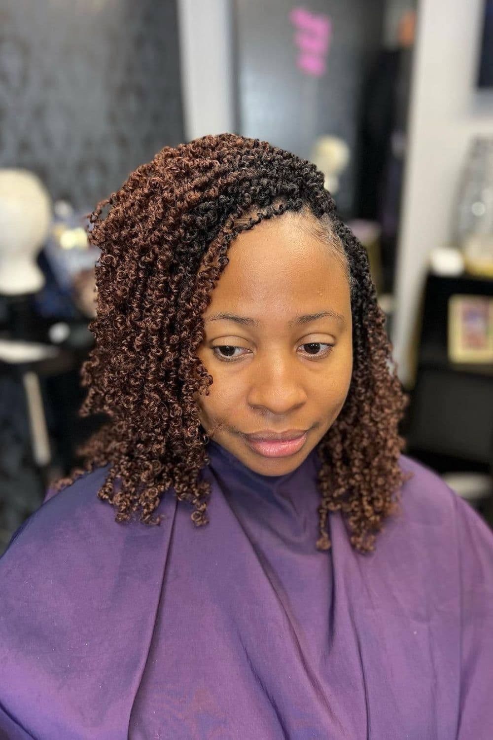 A woman with brown crochet twists.