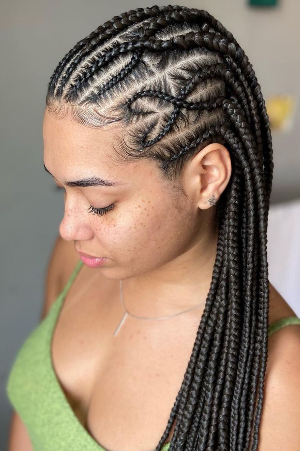 A woman with black Fulani braids.