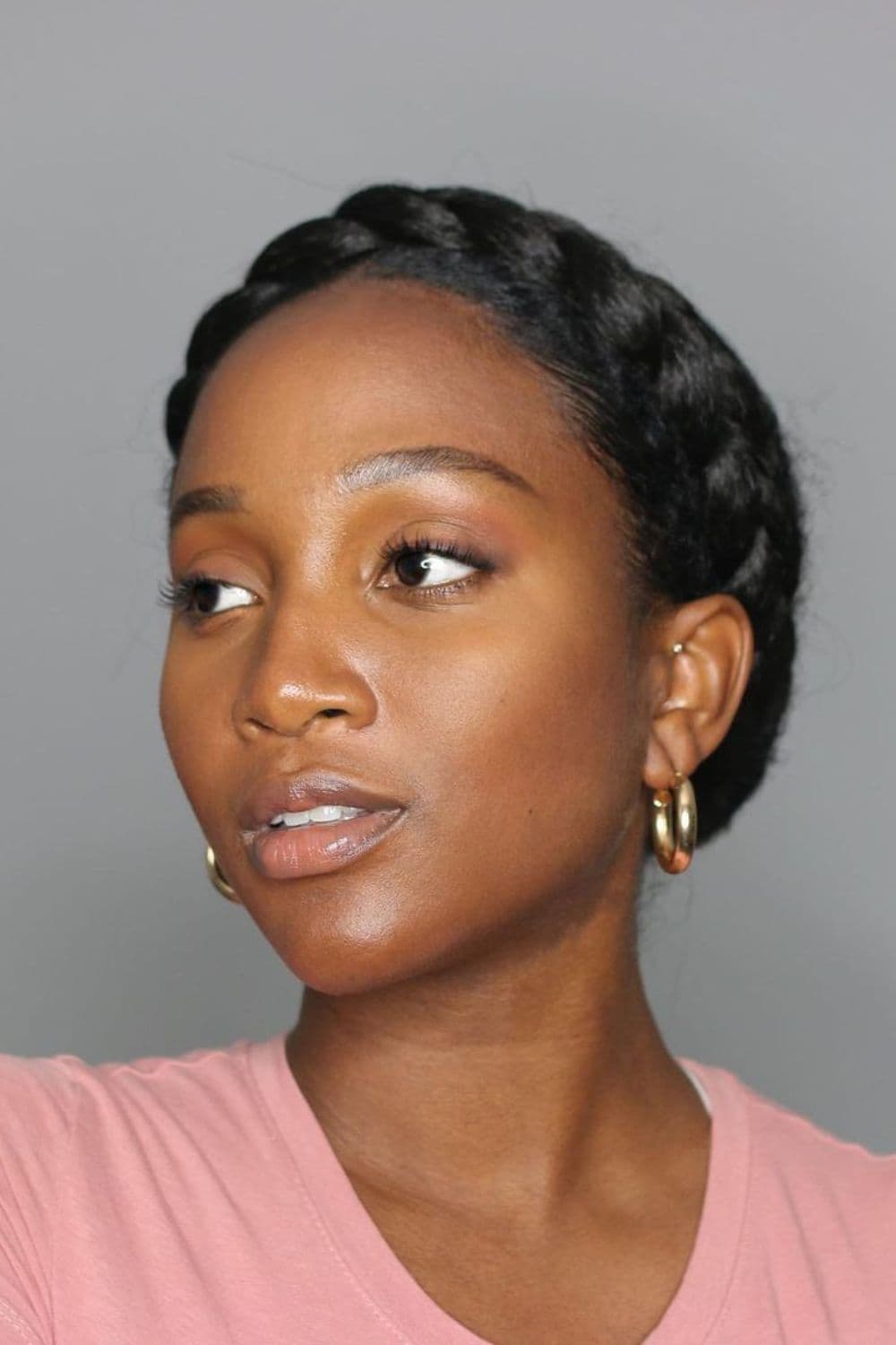 A woman with 4C halo braid.