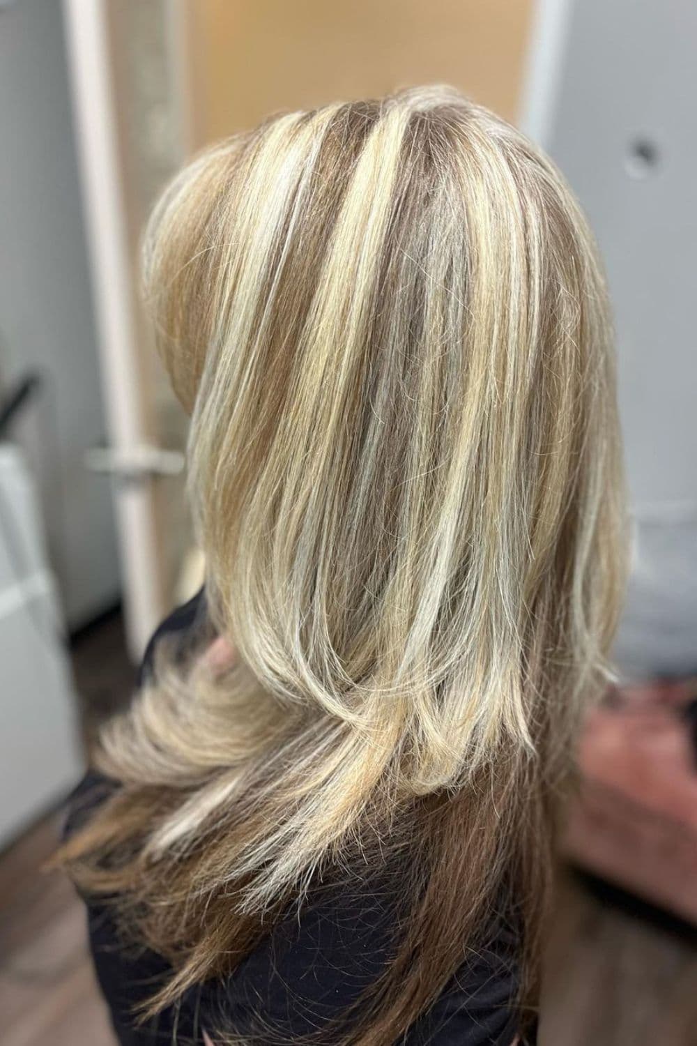 A woman with platinum blonde chunky highlights.