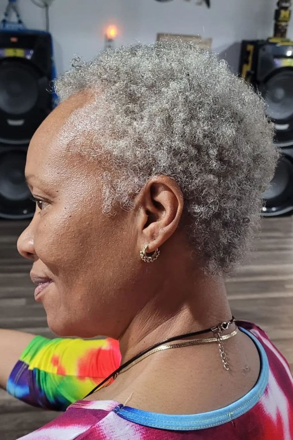 A woman with a gray teeny weeny Afro cut.