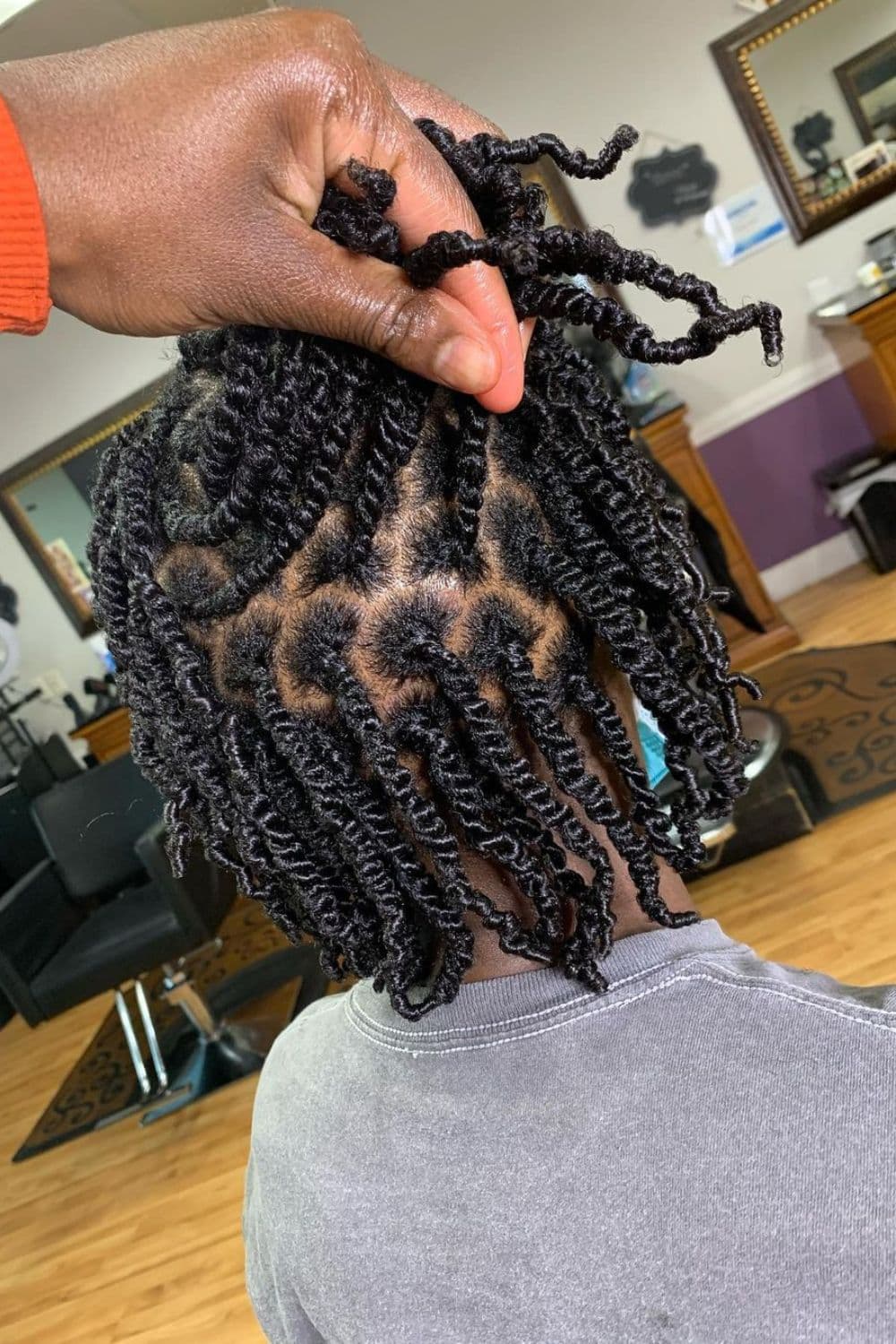 A woman with two-strand twists.