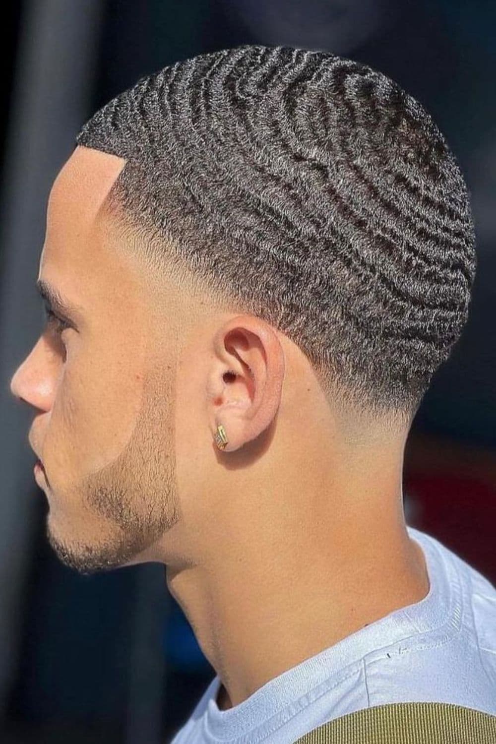 A man with buzzed 180 waves.