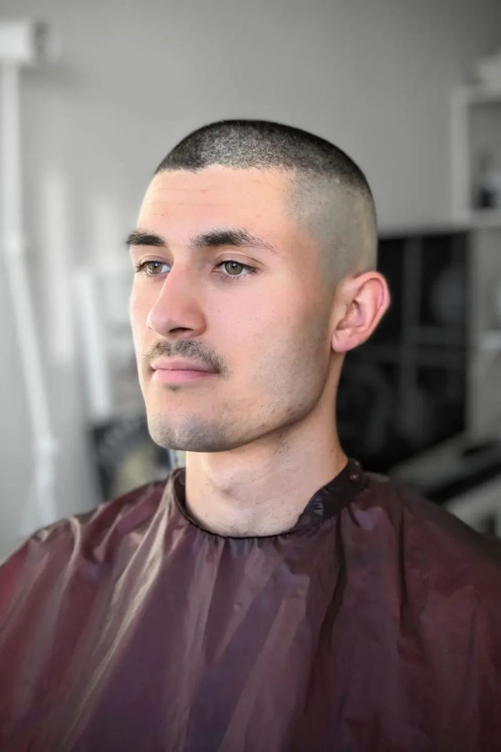 A man with a high and tight haircut.