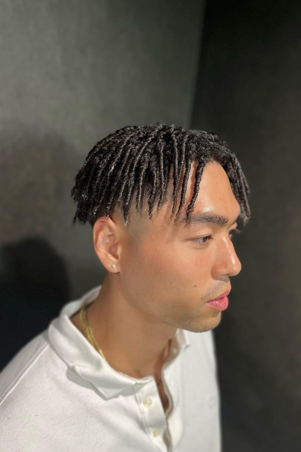 A man with one-strand comb twists.
