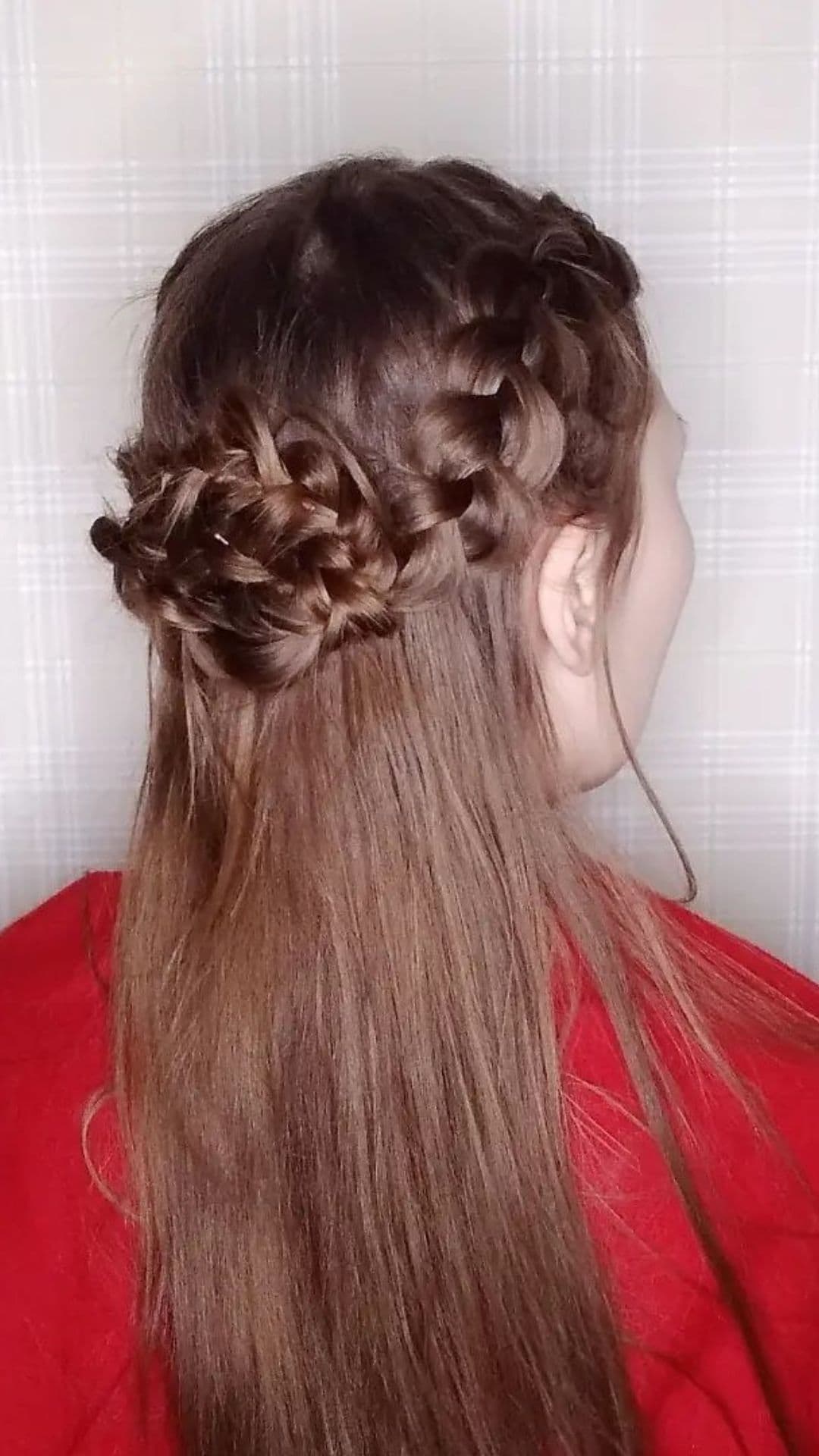 A woman with a French braid crown.