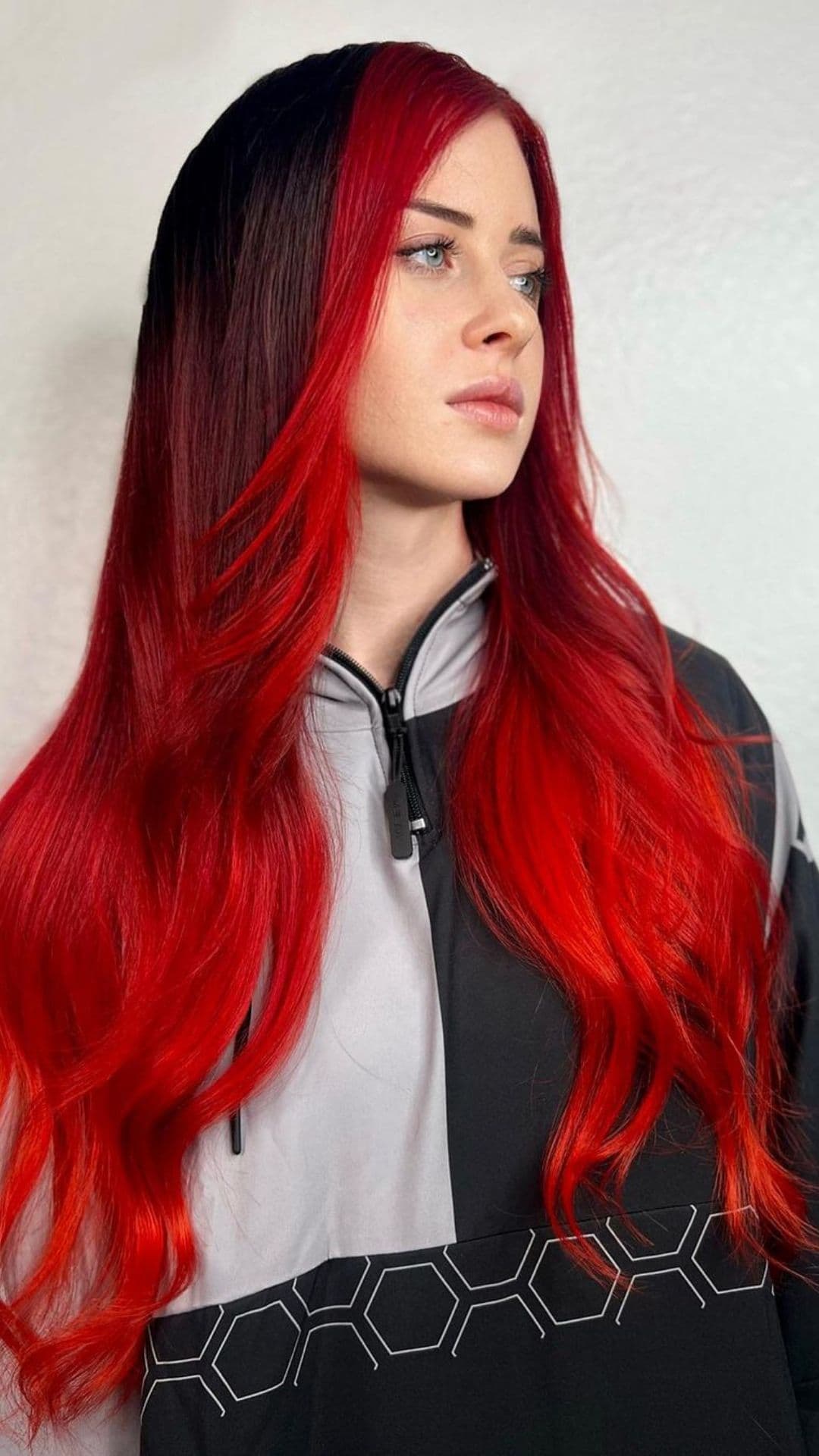 A woman with a red ombre hair.