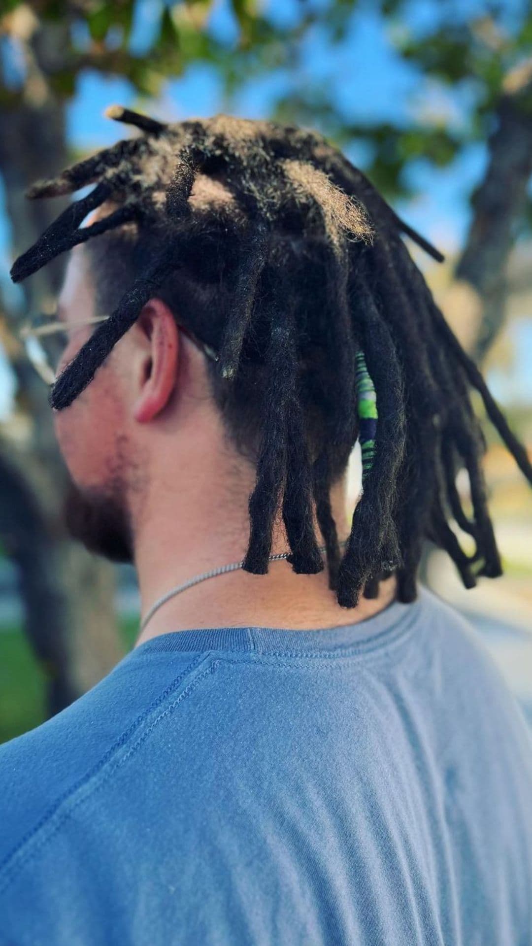 A man with a dreadlocks mullet.