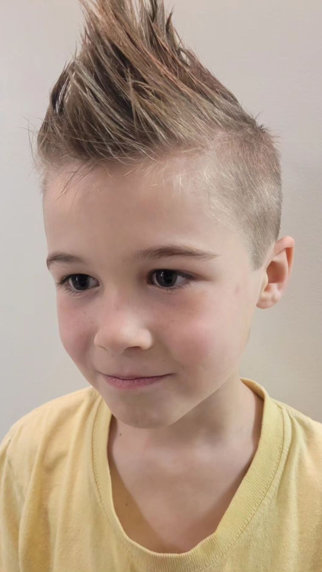 A boy with a faux hawk.