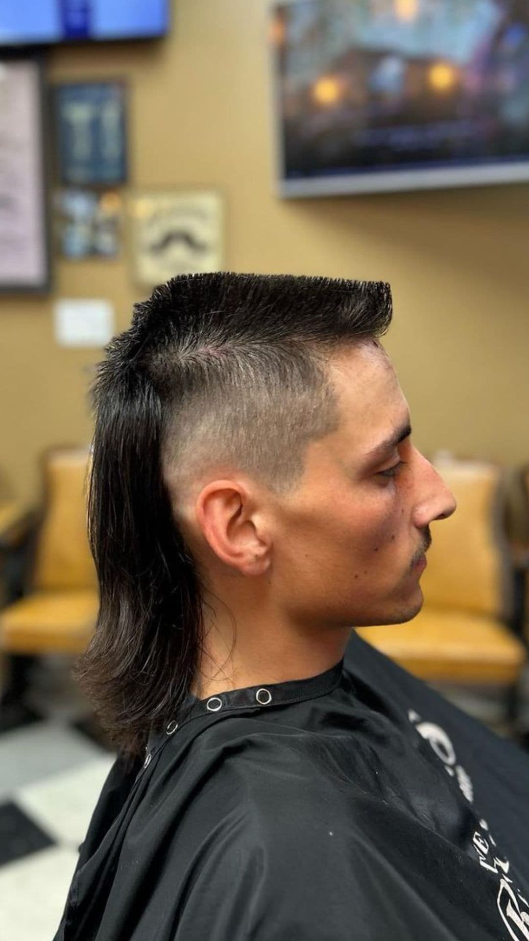 A man with a flattop mullet.