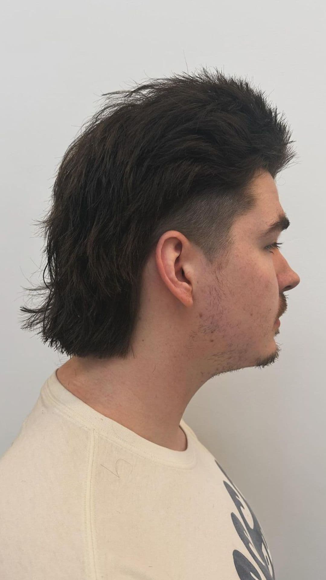 A man with a layered mullet.