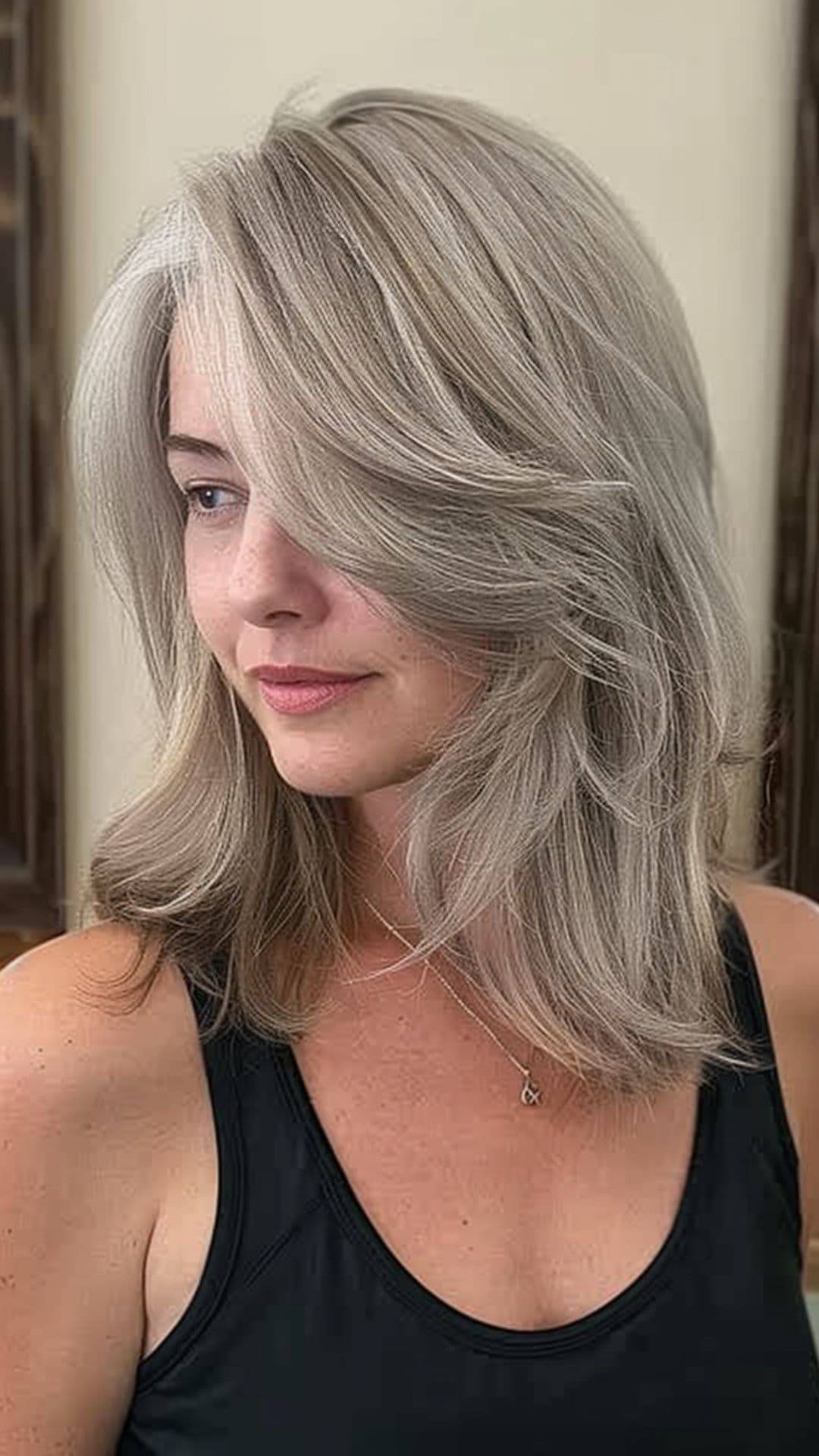 A woman modelling an antique gray hair.