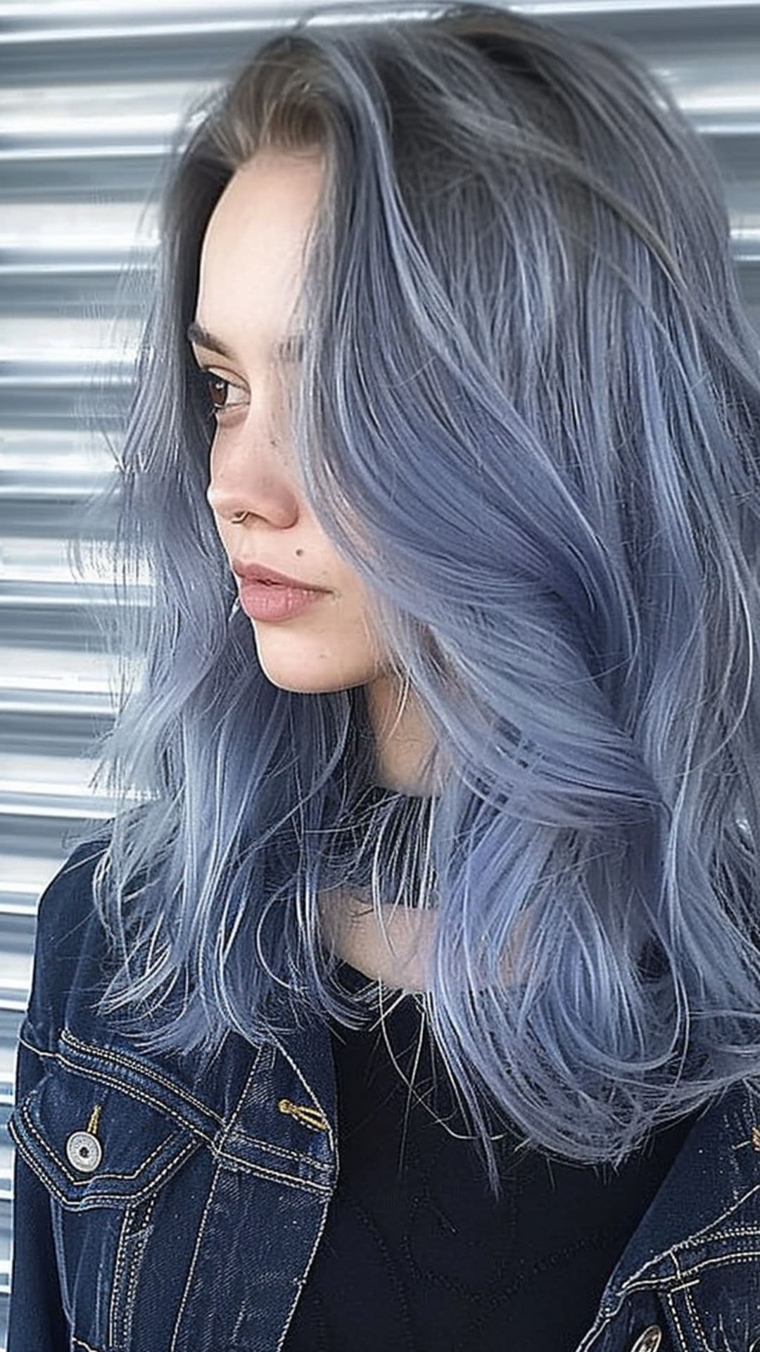 A woman modelling a blue gray hair.