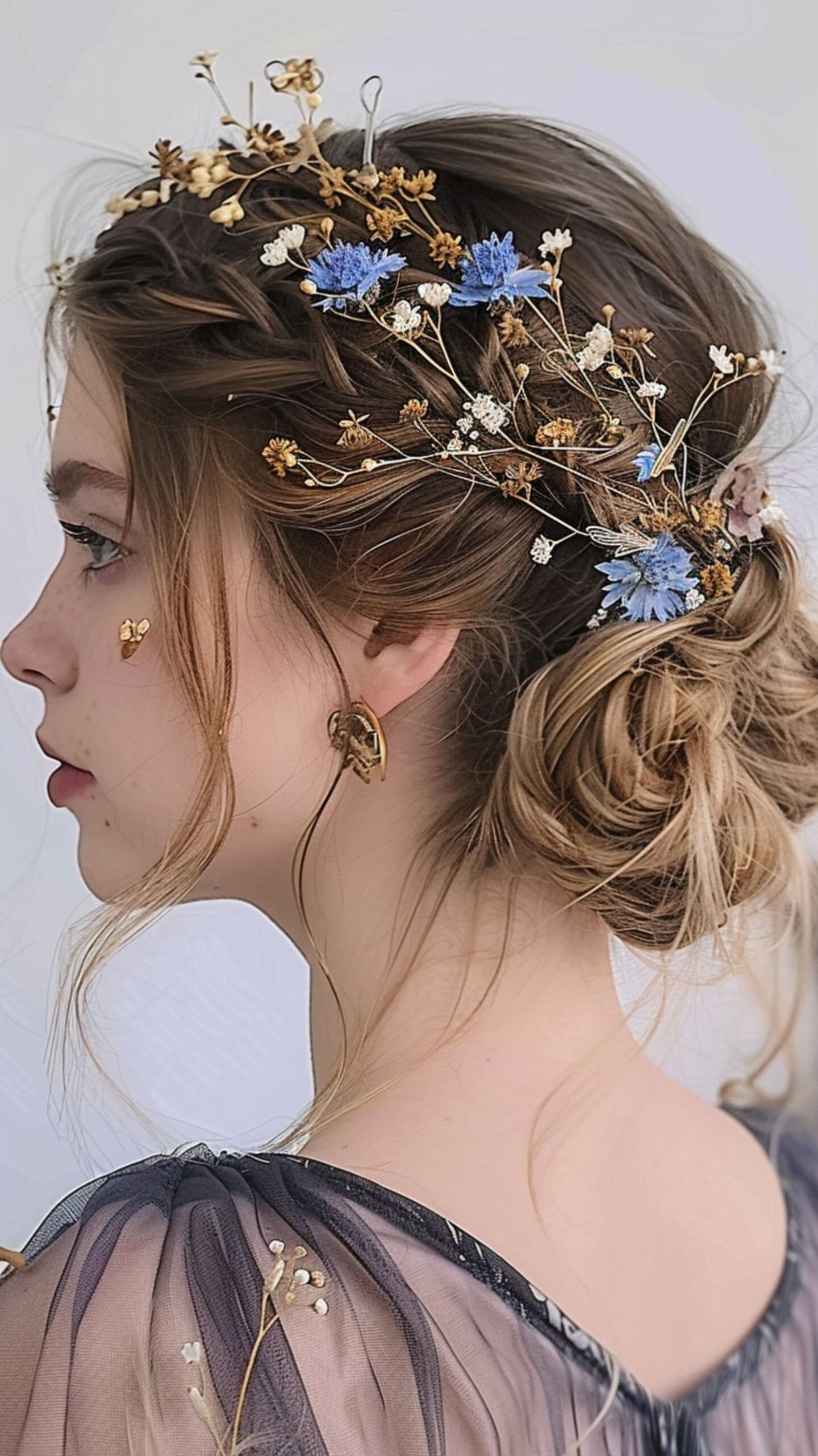 A woman modelling a crown braid with hair accessories hairstyle.