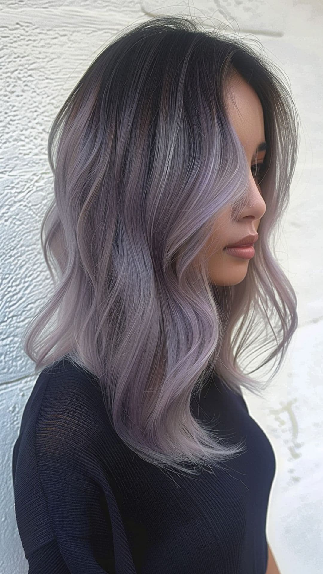 A woman modelling a gray lilac hair.