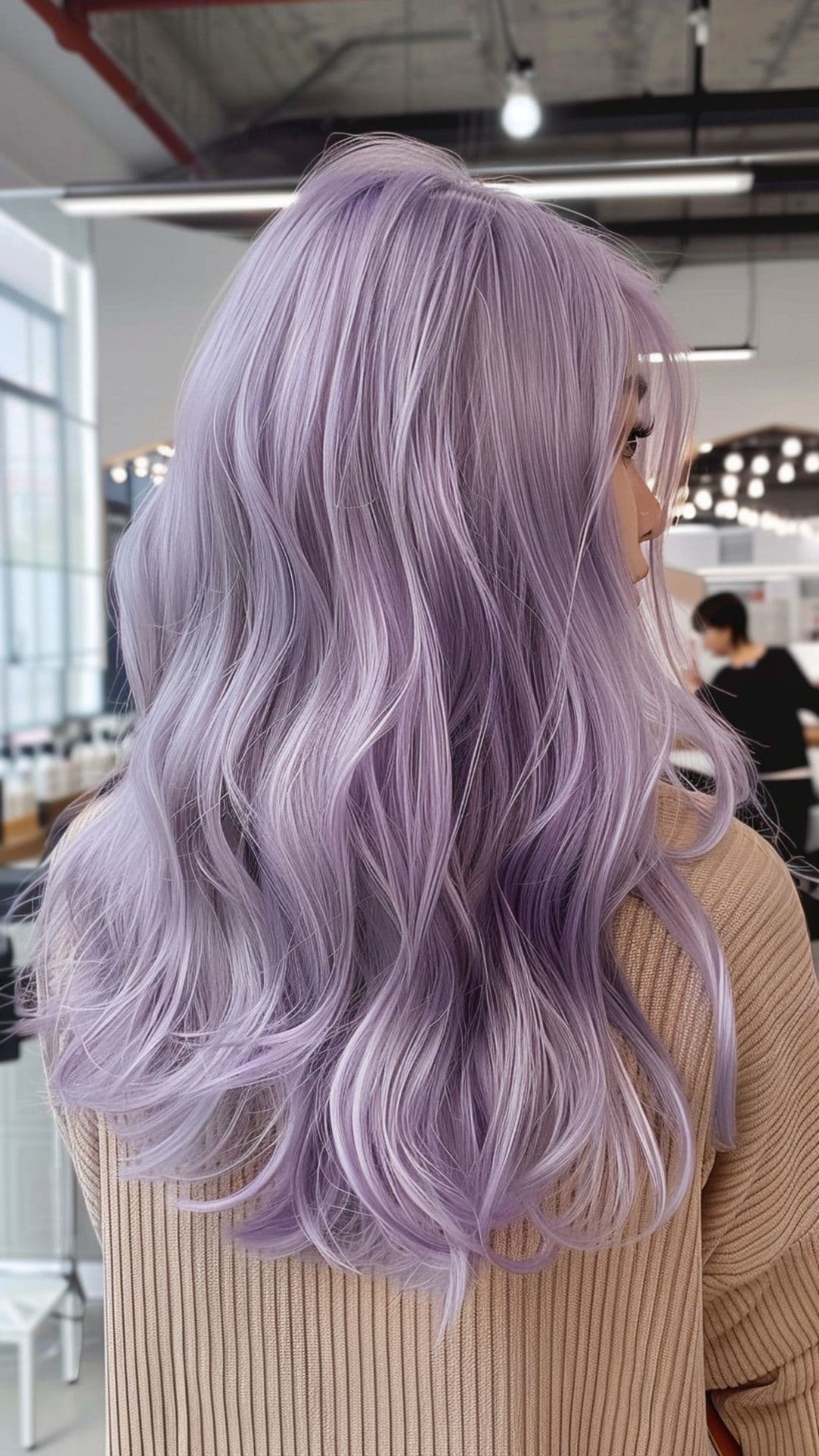 A woman modelling a lilac hair color.
