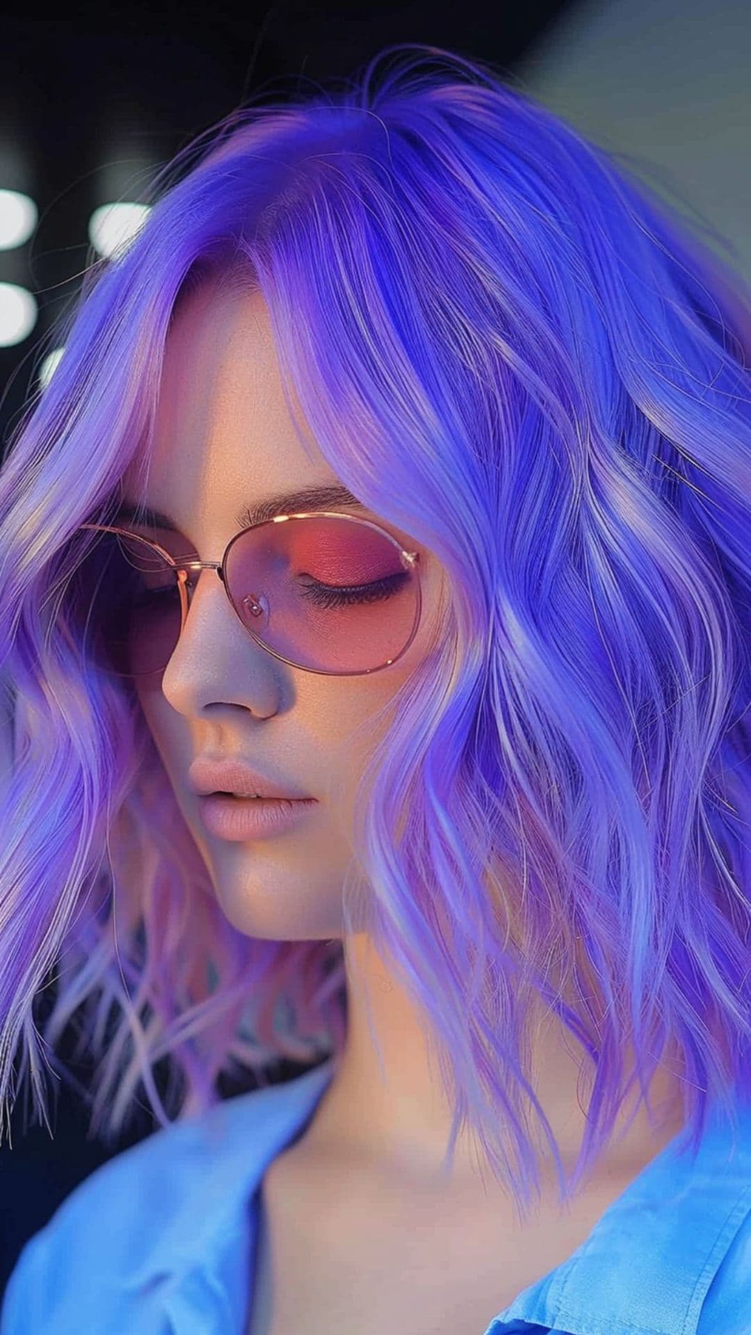 A woman modelling a neon lavender hair.