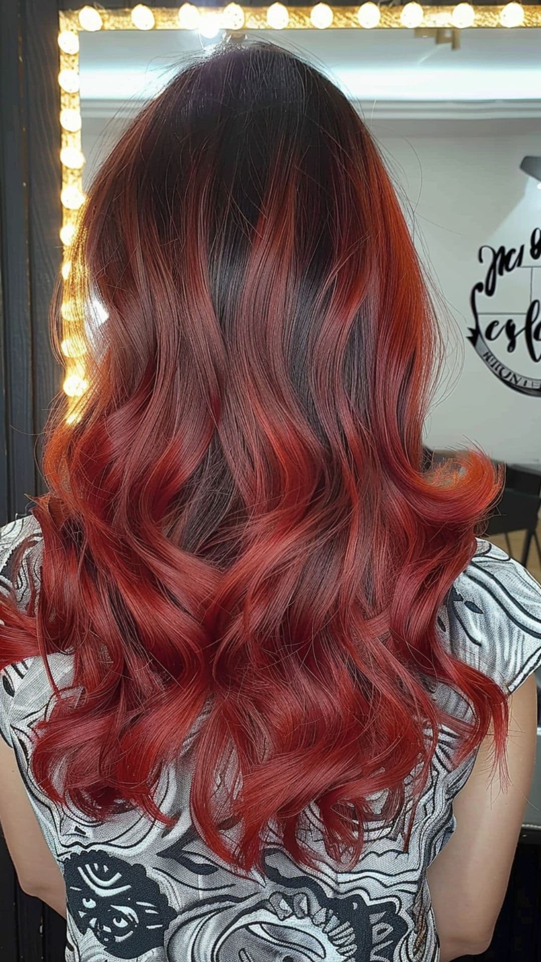 A woman modelling a red ombre hair.