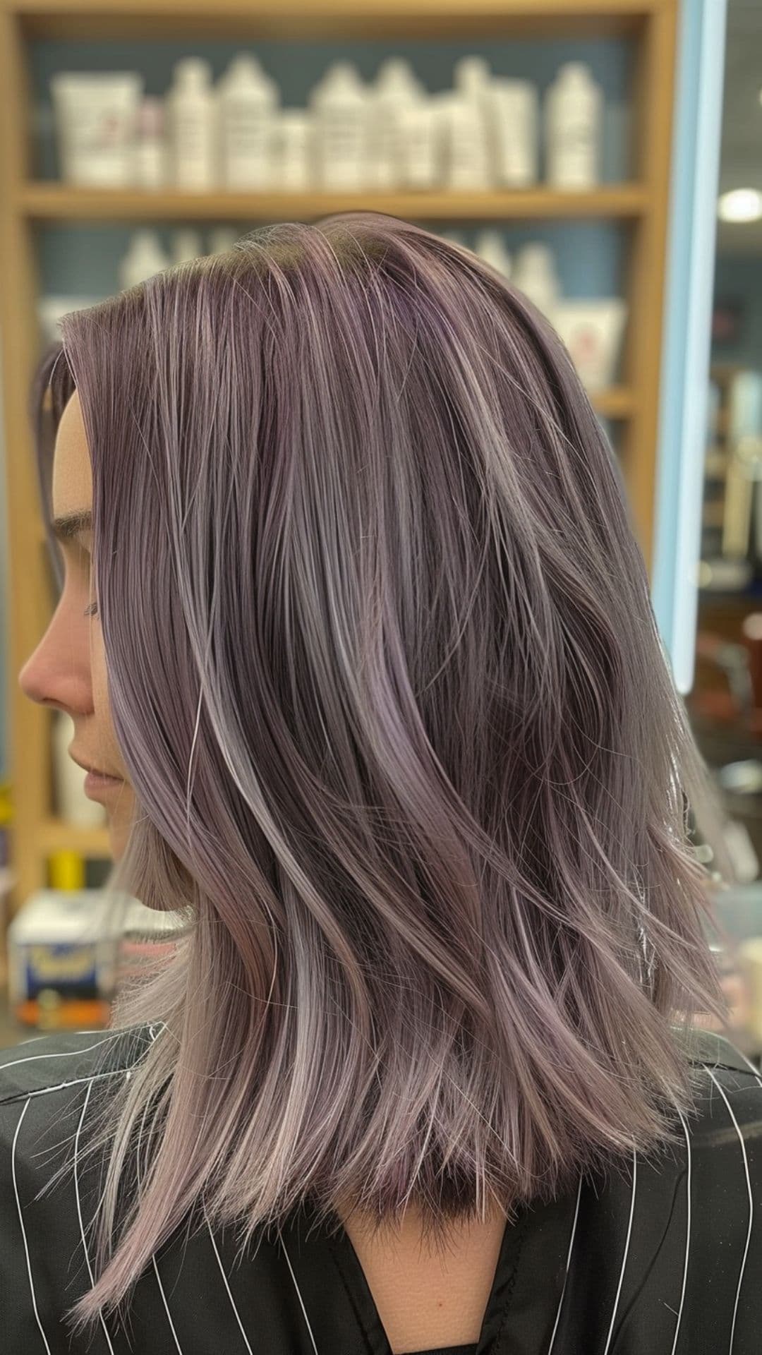 A woman modelling a silver purple hair.