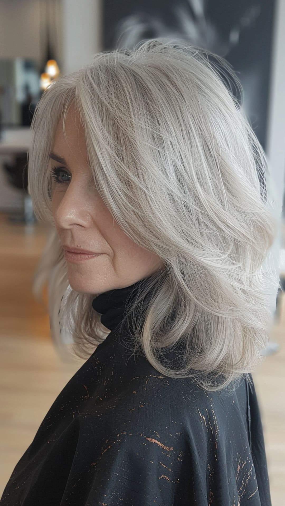An old woman modelling a soft silver hair.
