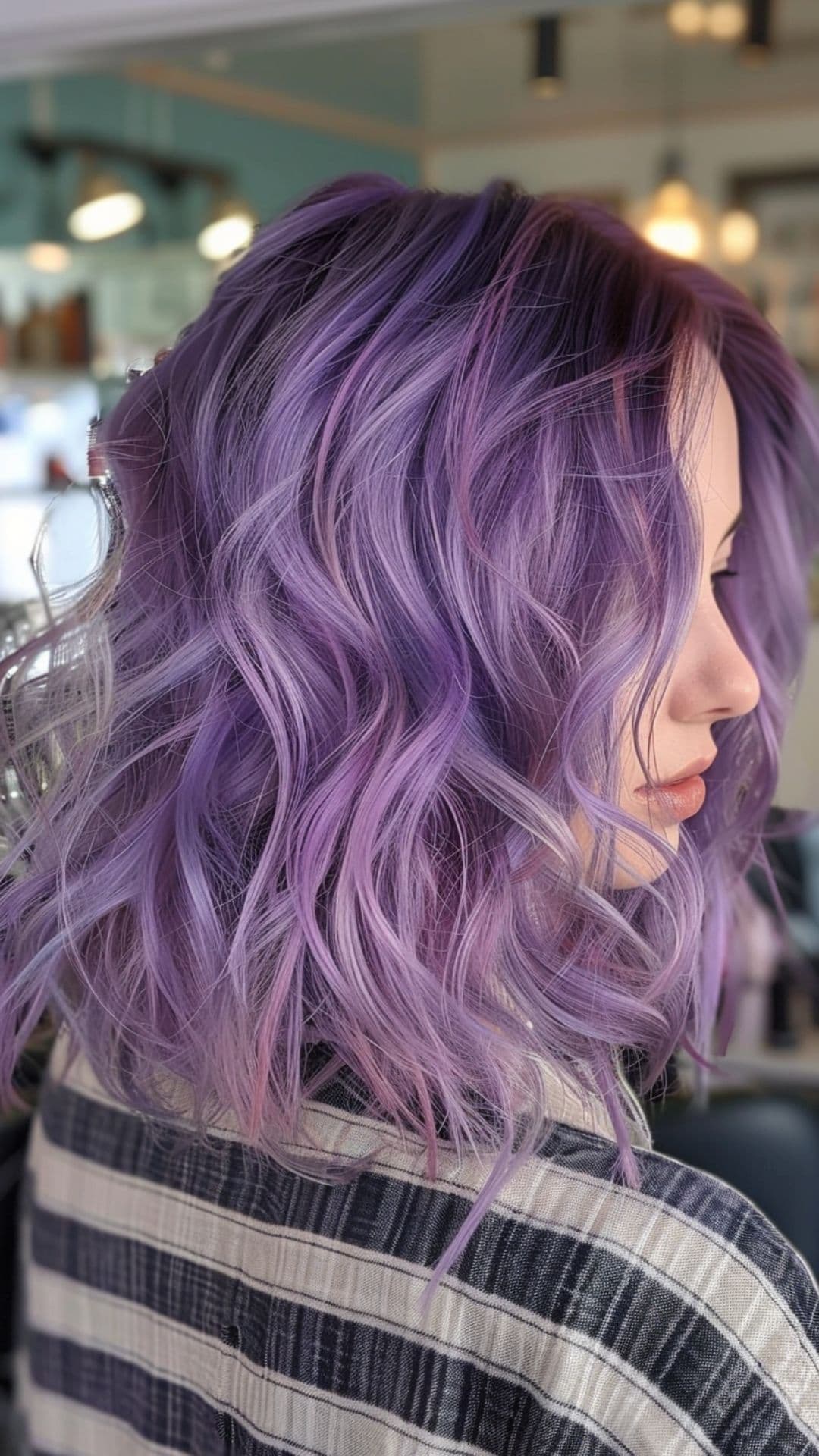 A woman modelling a bright lavender hair.