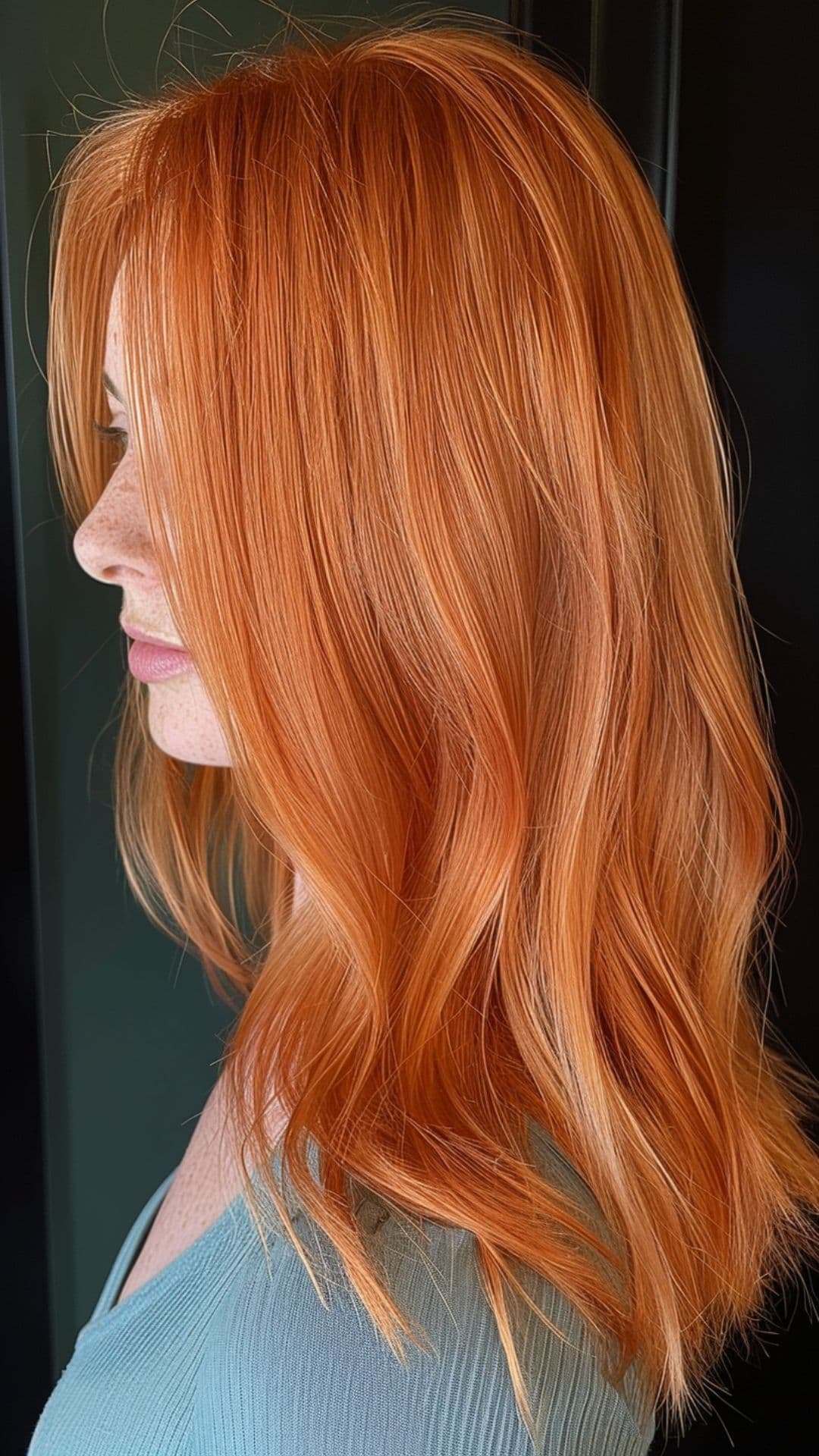 A woman modelling a copper hair.