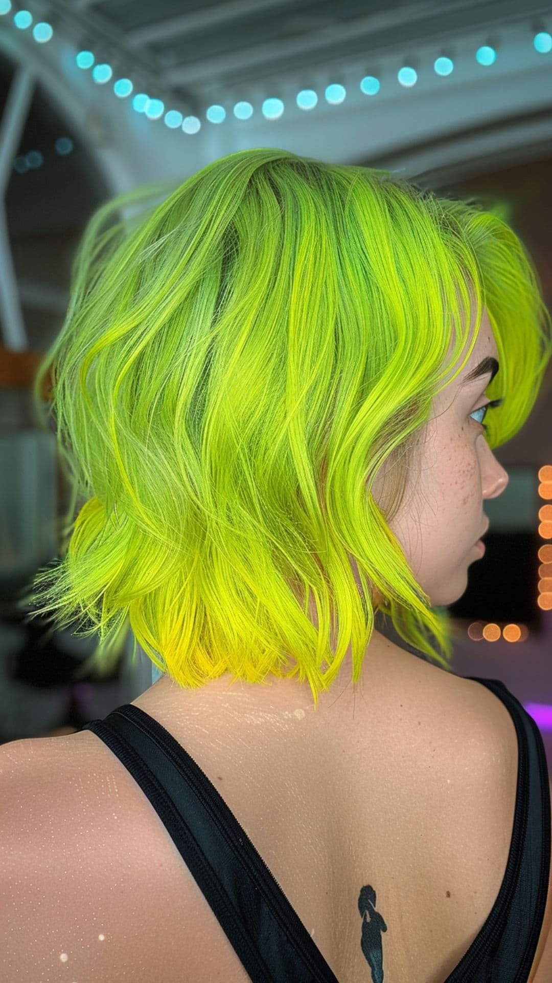 A woman modelling a fluorescent hair.