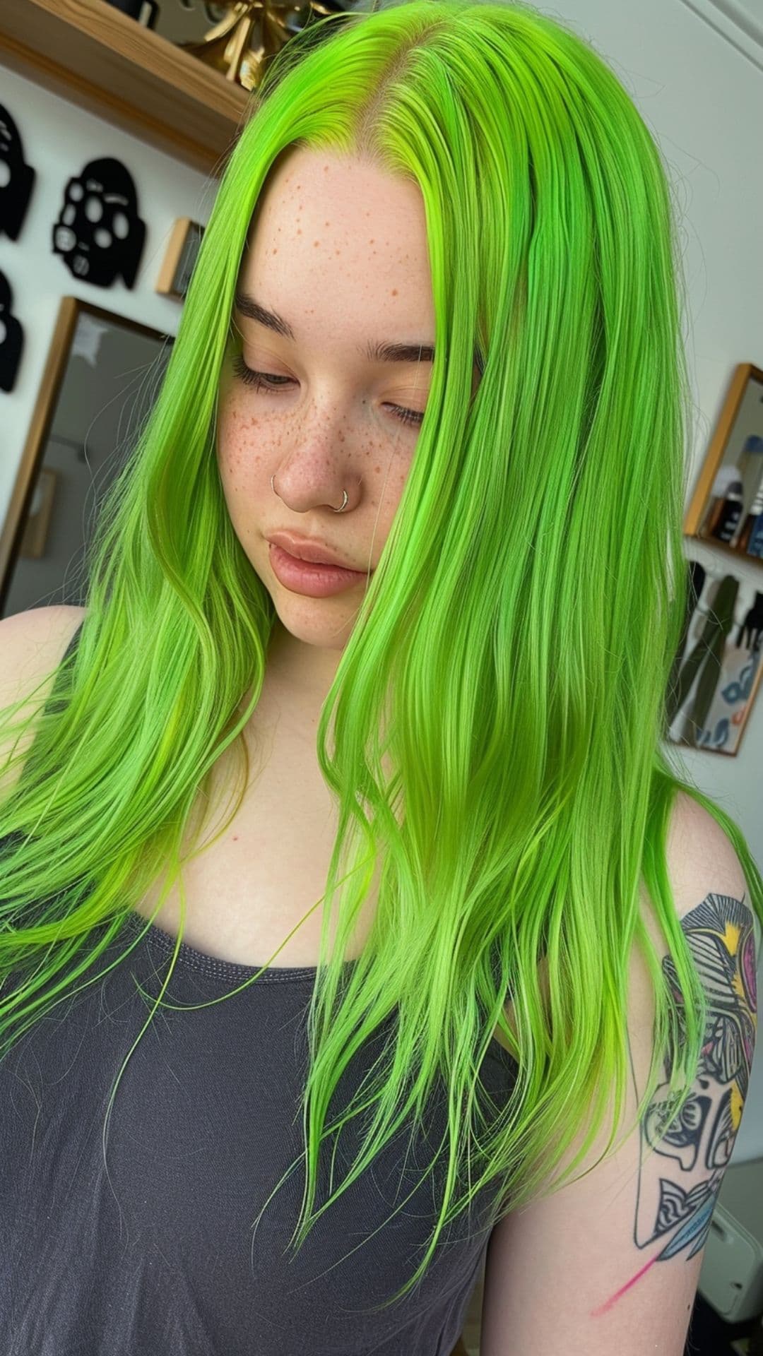 A young woman modelling a neon green hair.