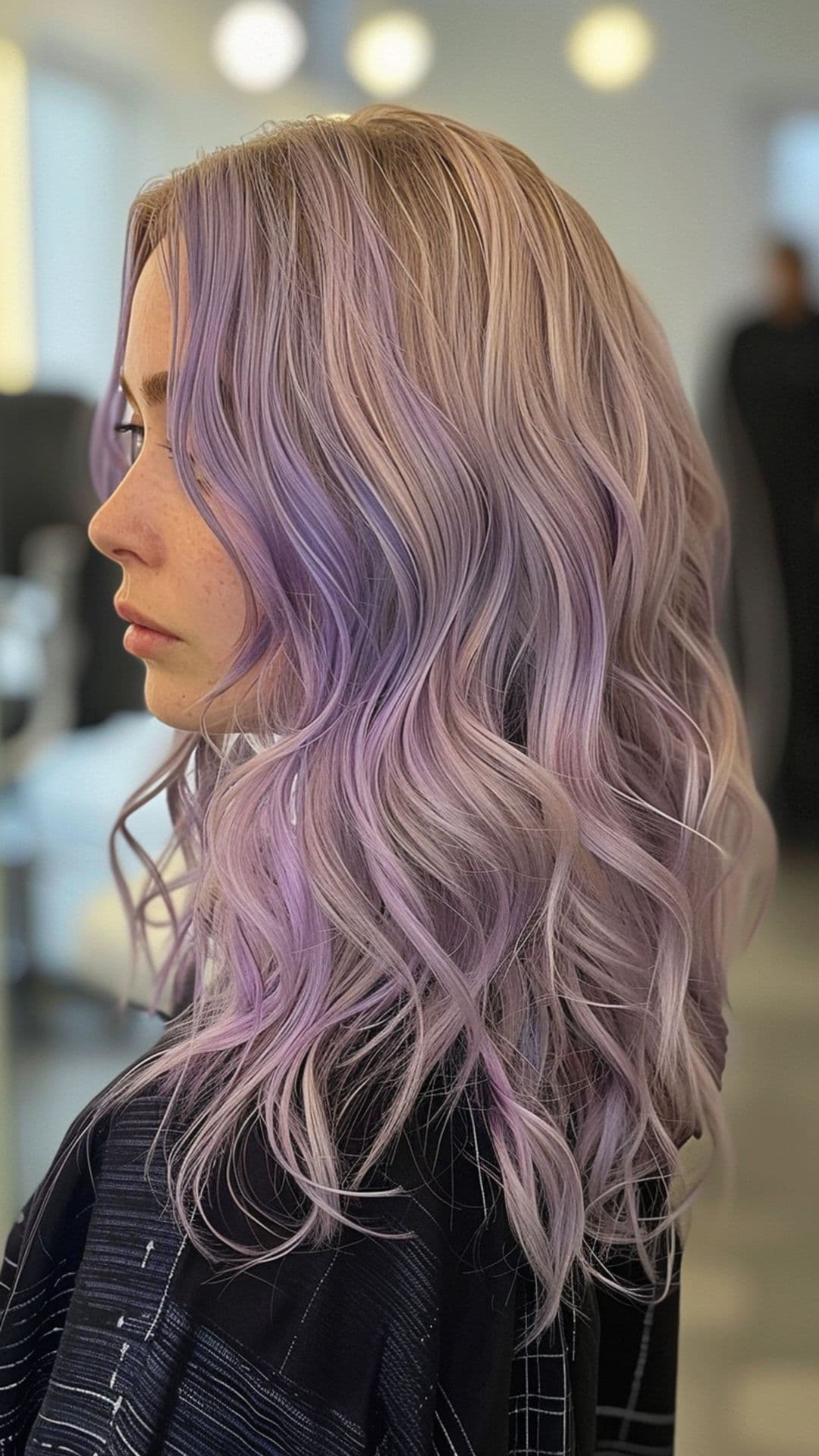 A woman modelling a pastel lilac hair.