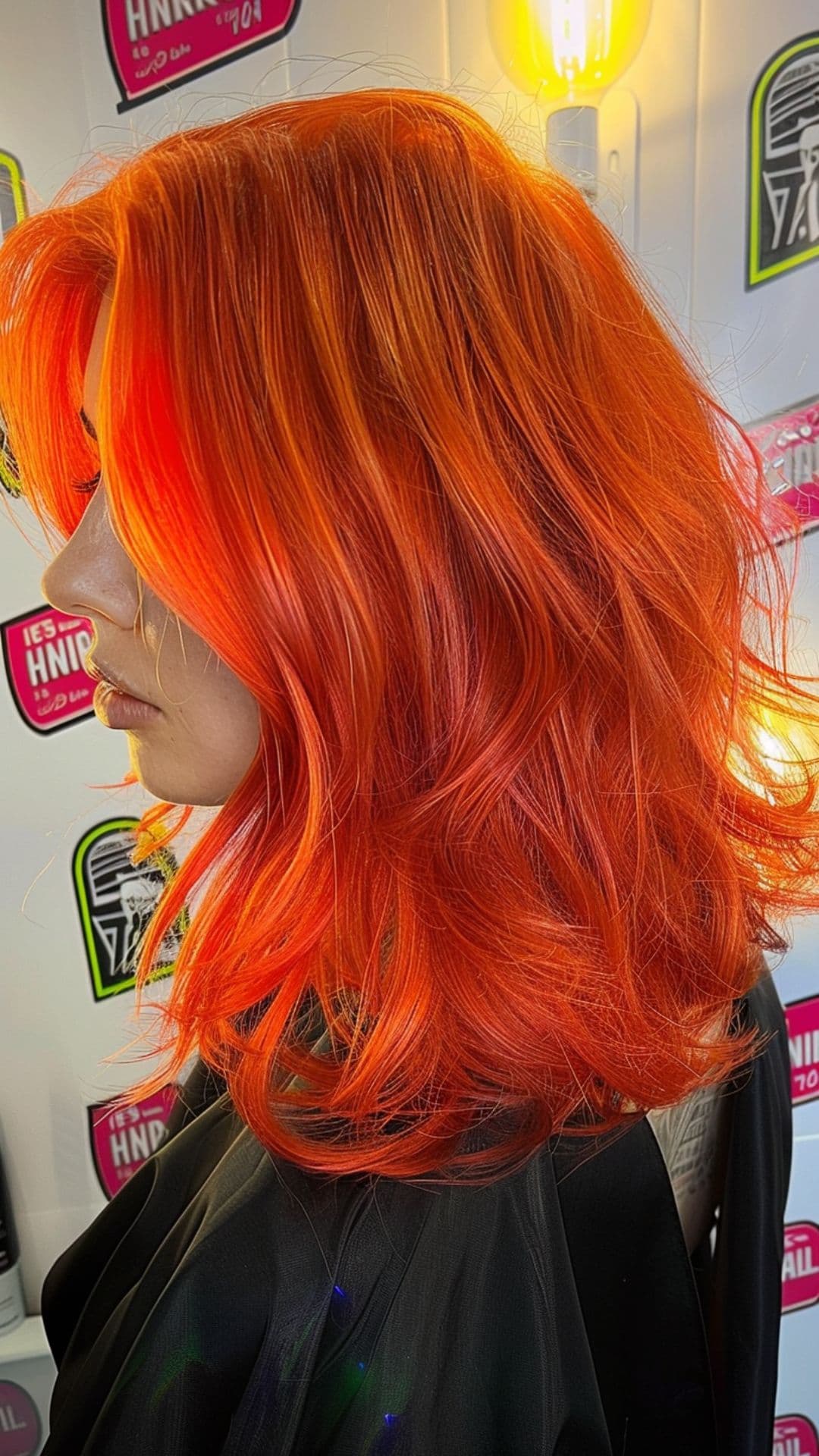 A woman modelling a tangerine hair.