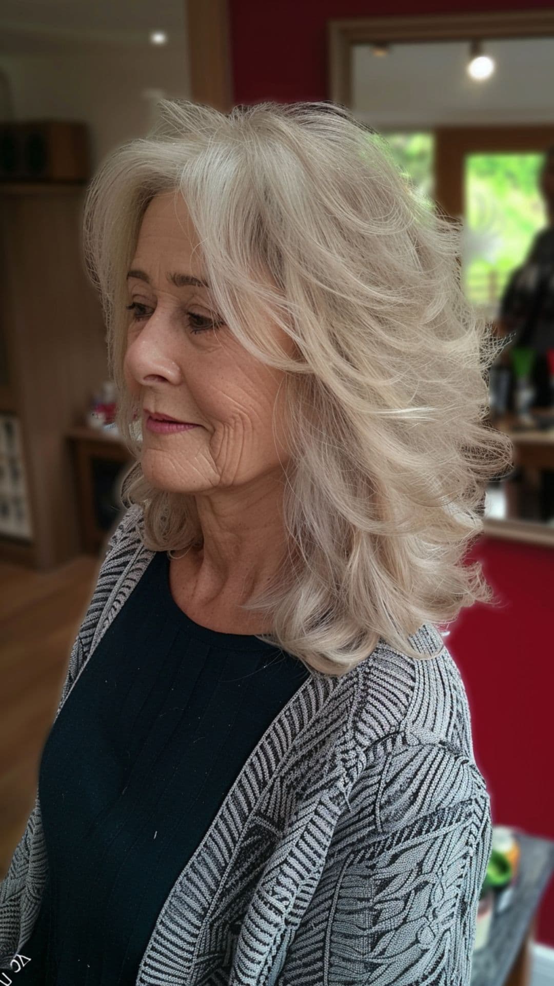 An old woman modelling a textured layered cut.