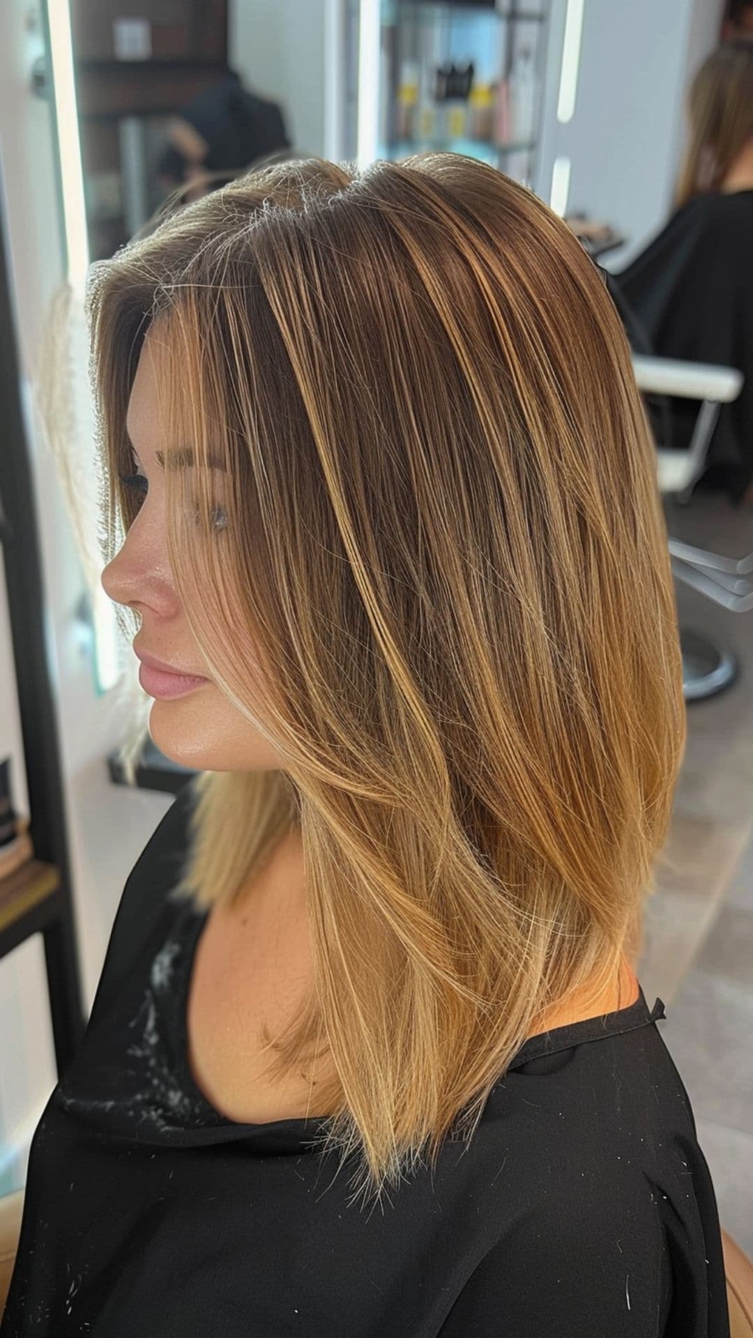 A woman modelling a soft ombre hair.