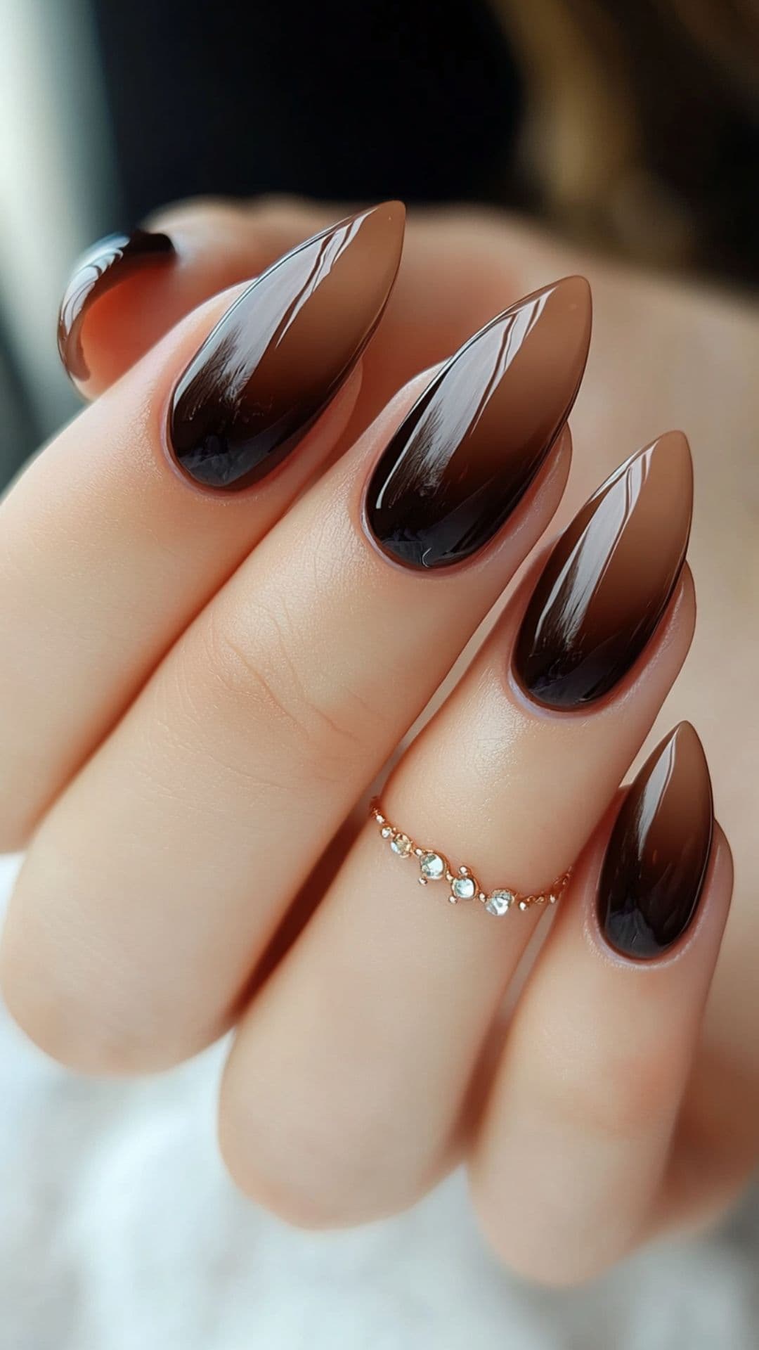 Woman's nails in Chocolate Brown Ombre design.