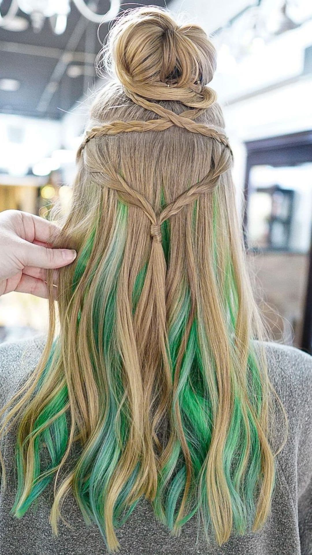 A woman modelling a Crown of Twists hairstyle.