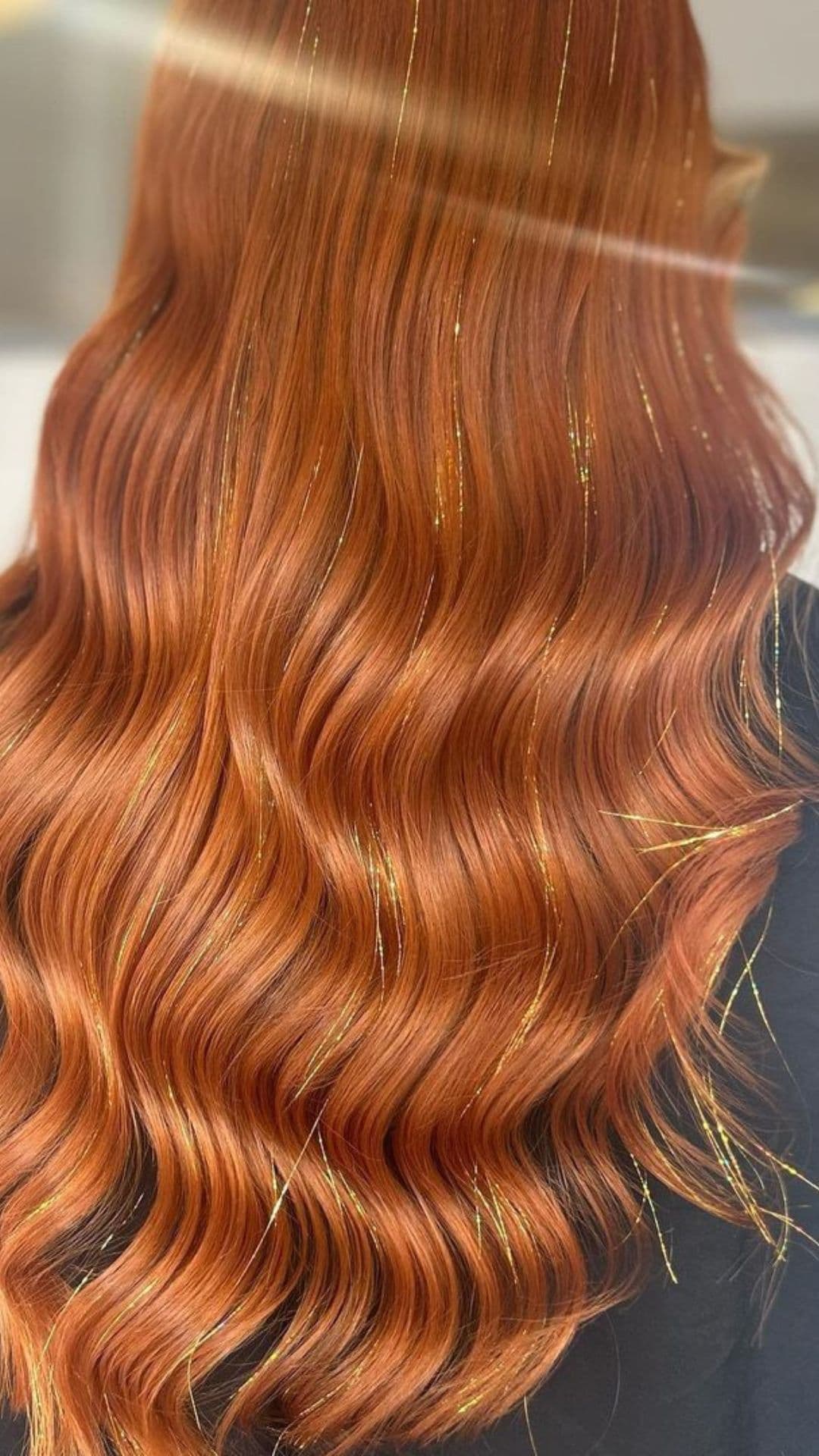 A woman modelling a Cascading Waves with Glitter hairstyle.