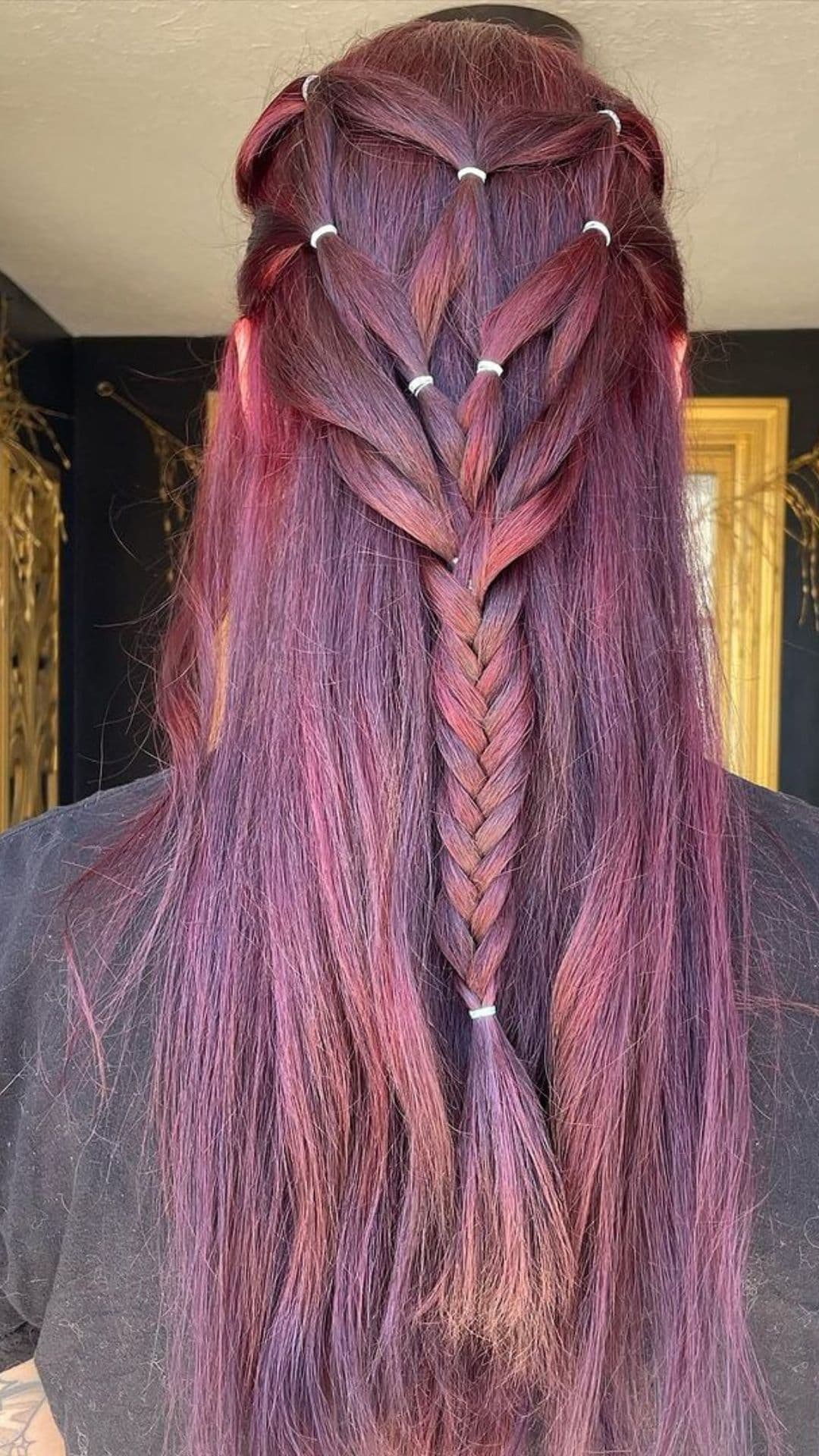 A woman modelling a Complex Braided hairstyle.