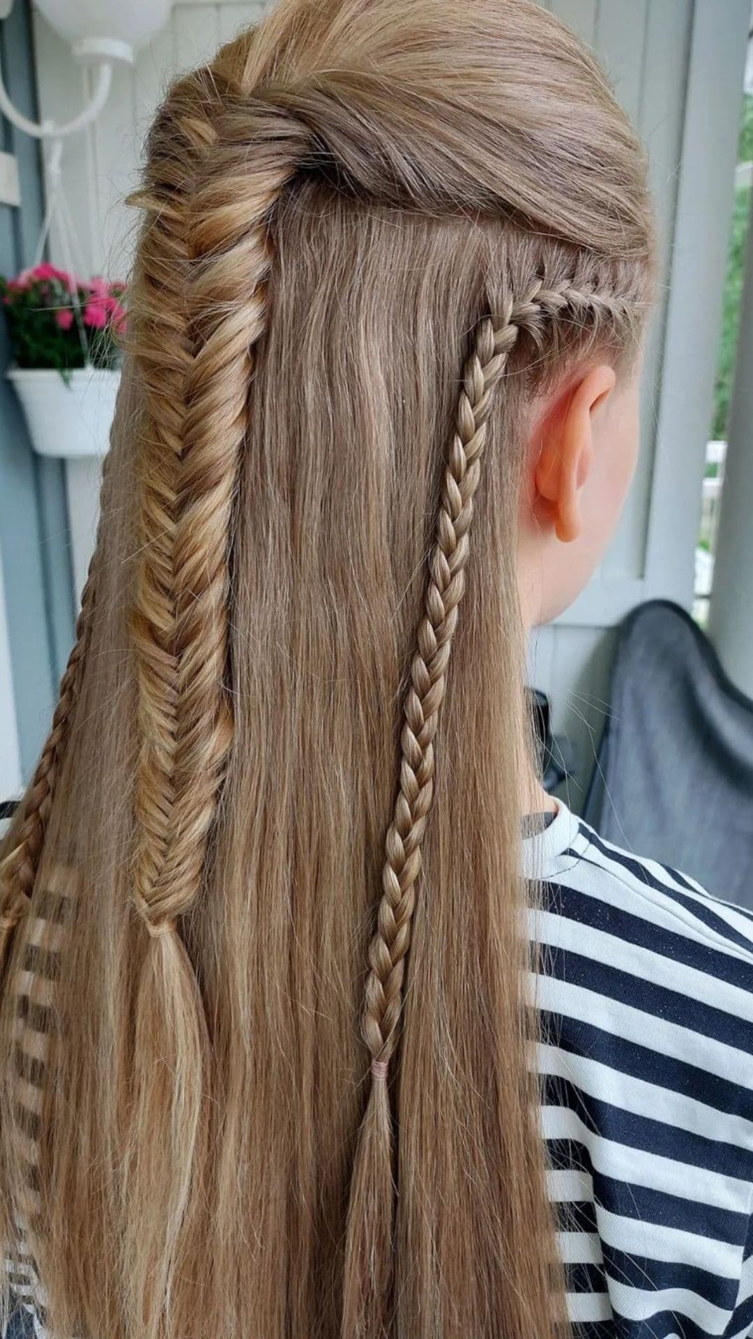 A woman modelling a Legolas hairstyle.