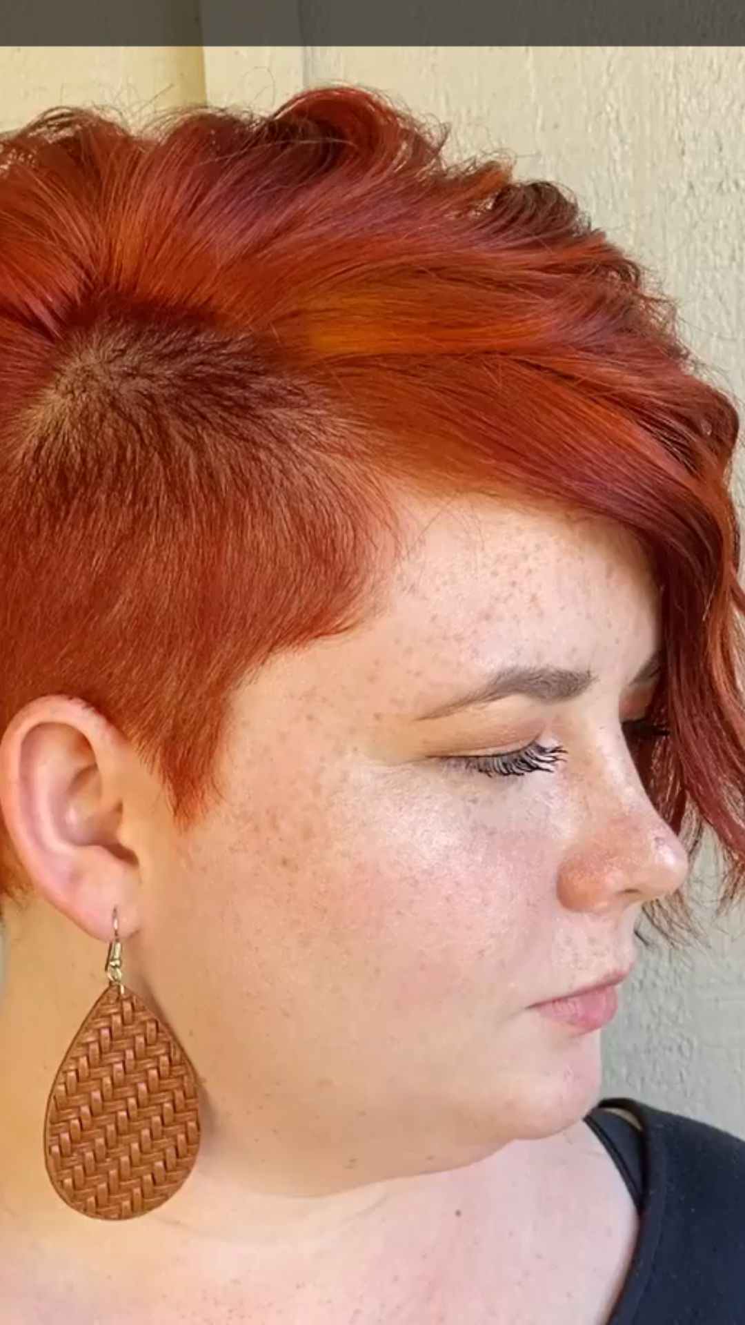 A round-faced woman with double chin modelling a Asymmetrical Bixie hairstyle.
