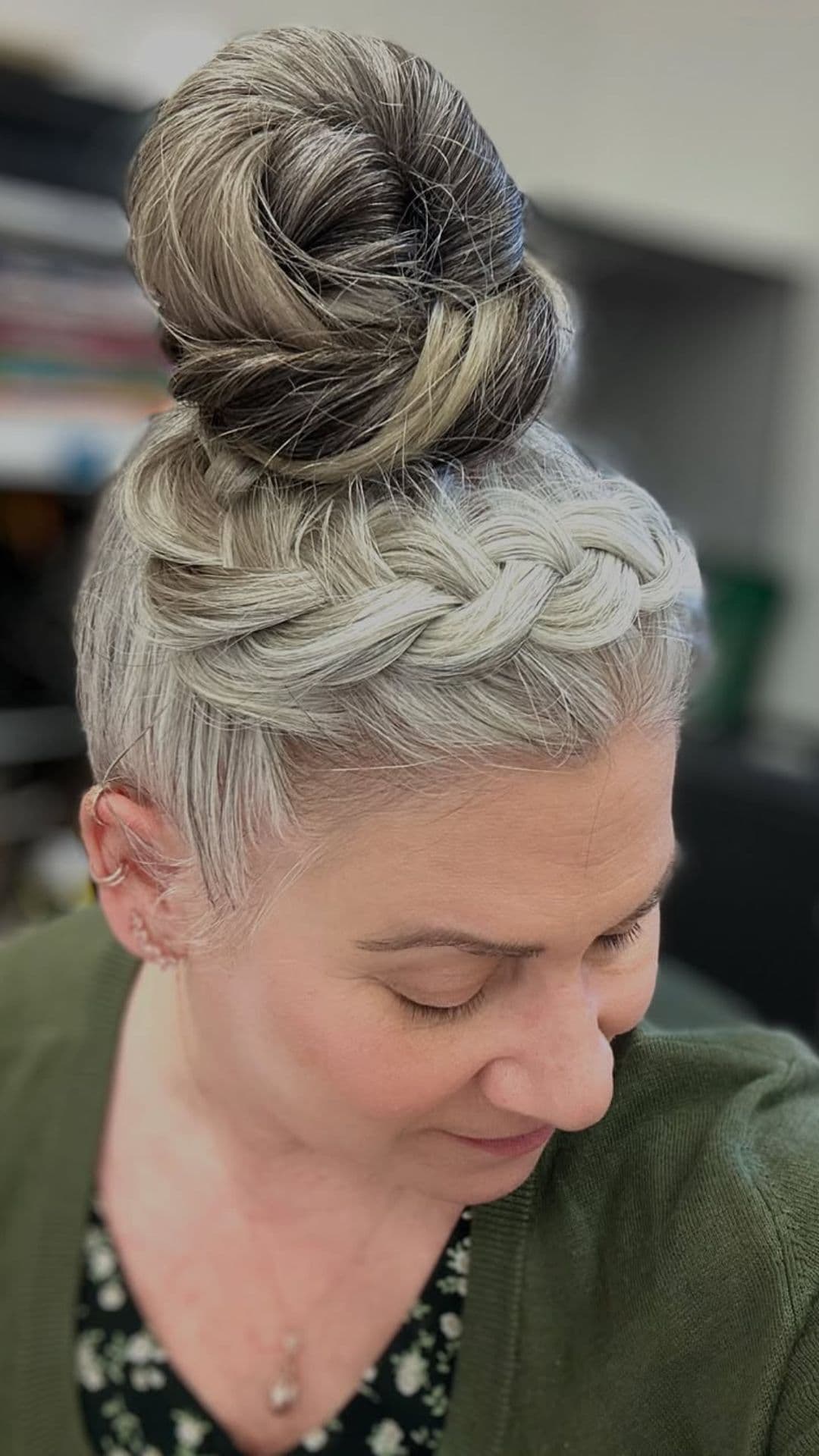 An old woman modelling a Braided Updo hairstyle.