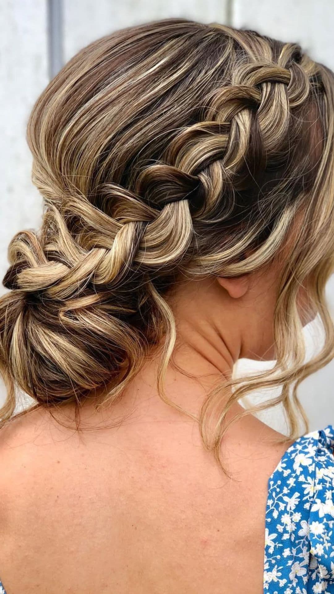 An old woman modelling a Plaited Chignon hairstyle.