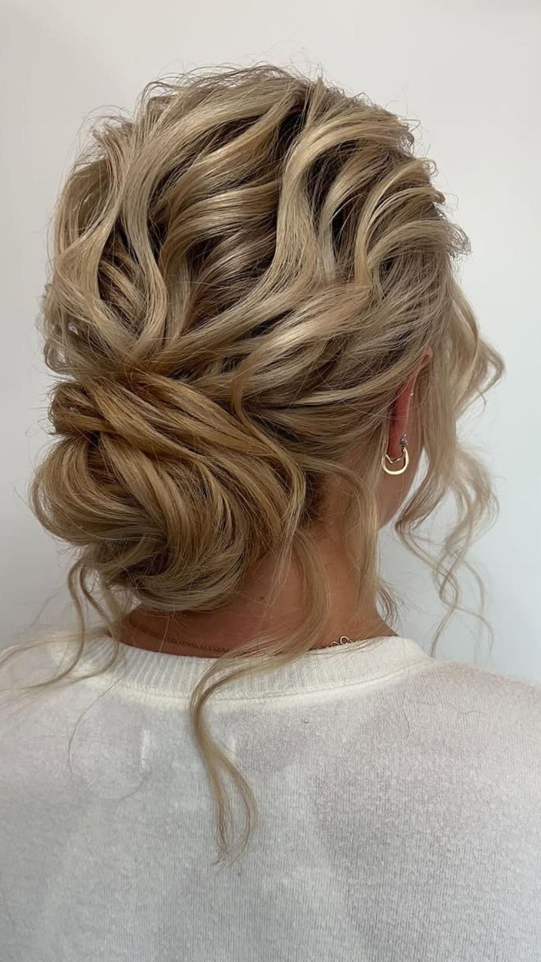 An old woman modelling a Textured Updo with Curls hairstyle.